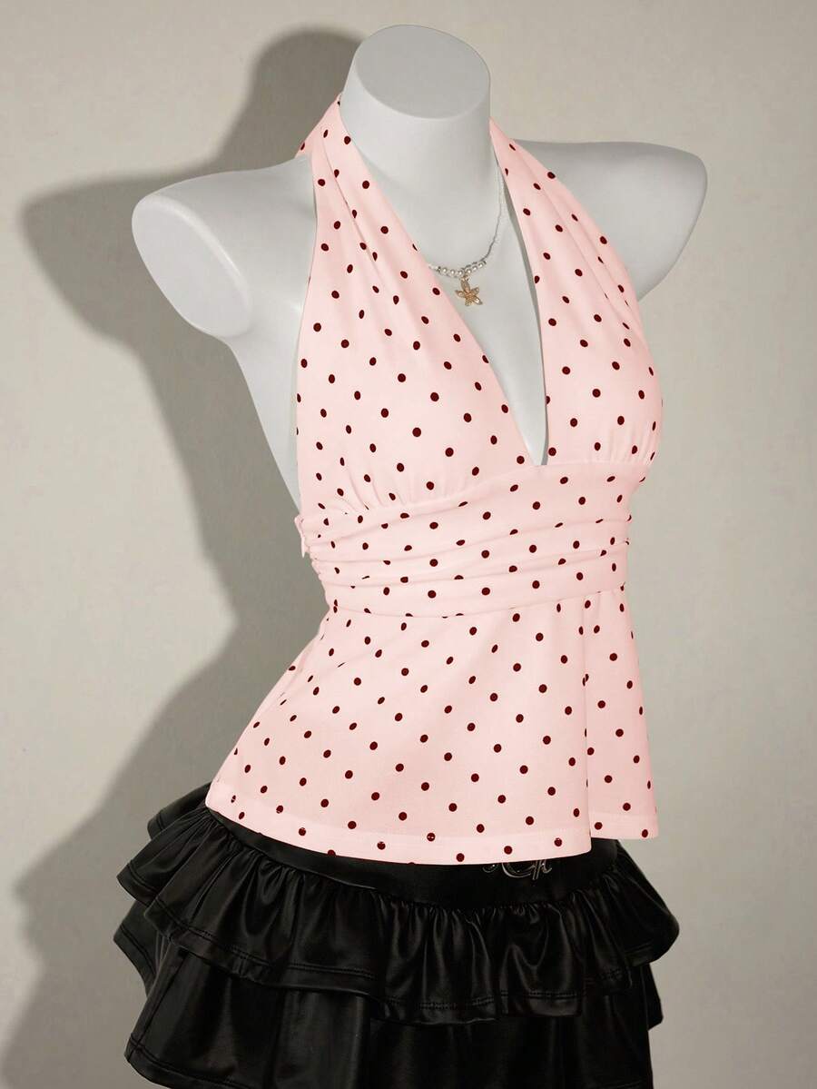 White women's deep V-neck halter tank top with ruched waist, backless design, rib-knit texture, and ruffle hem