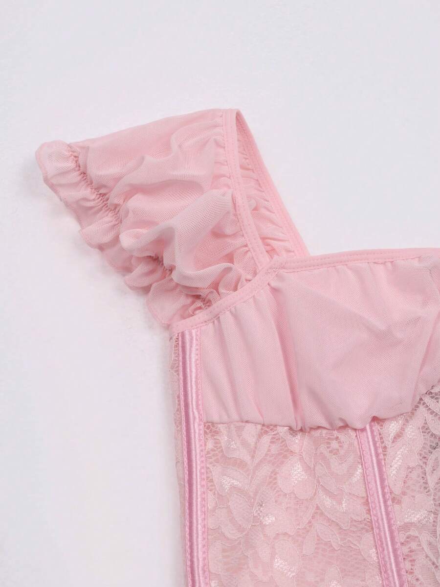Front view of a vintage lace corset crop top featuring boned structure, square neckline, and lace-up details.