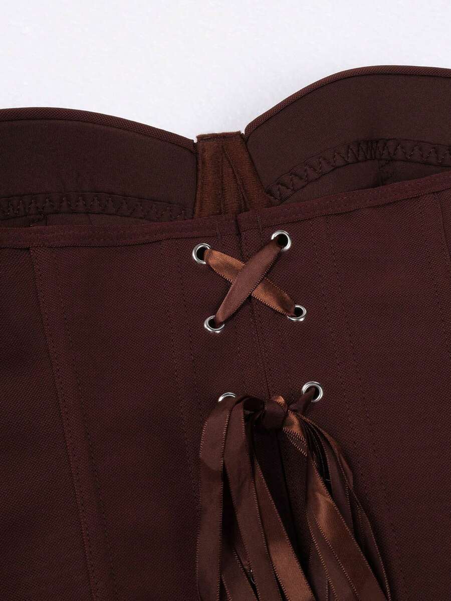 Solid color strapless corset tube top featuring a backless lace-up back design and cropped slim fit.