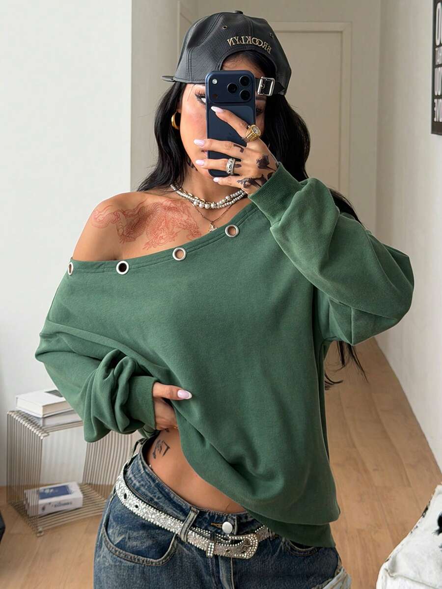 Women's sage green asymmetrical shoulder sweatshirt with button eyelet detail, drop shoulder long sleeves, and a loose casual fit.