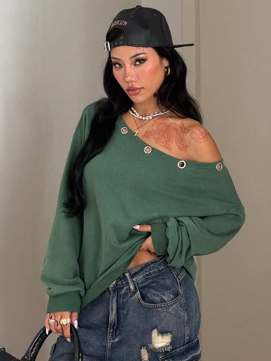 Women's sage green asymmetrical shoulder sweatshirt with button eyelet detail, drop shoulder long sleeves, and a loose casual fit.