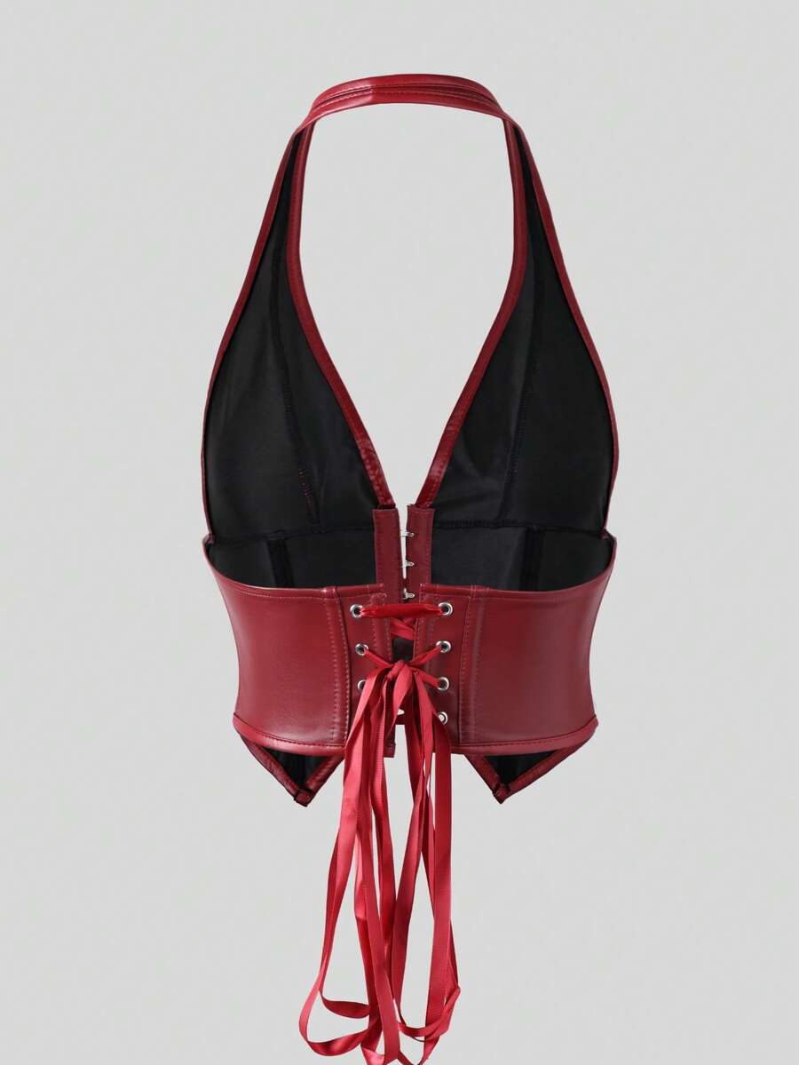 Retro PU halter tank top featuring a deep V-neck, grommet eyelet halter strap, tie back, boned details, and an asymmetrical hem.