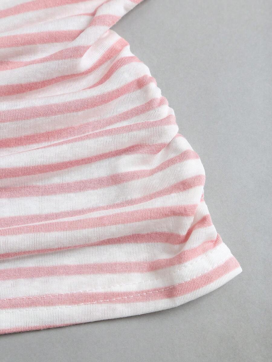 Women's striped tank top featuring an asymmetrical cold shoulder neckline and semi-sheer back.