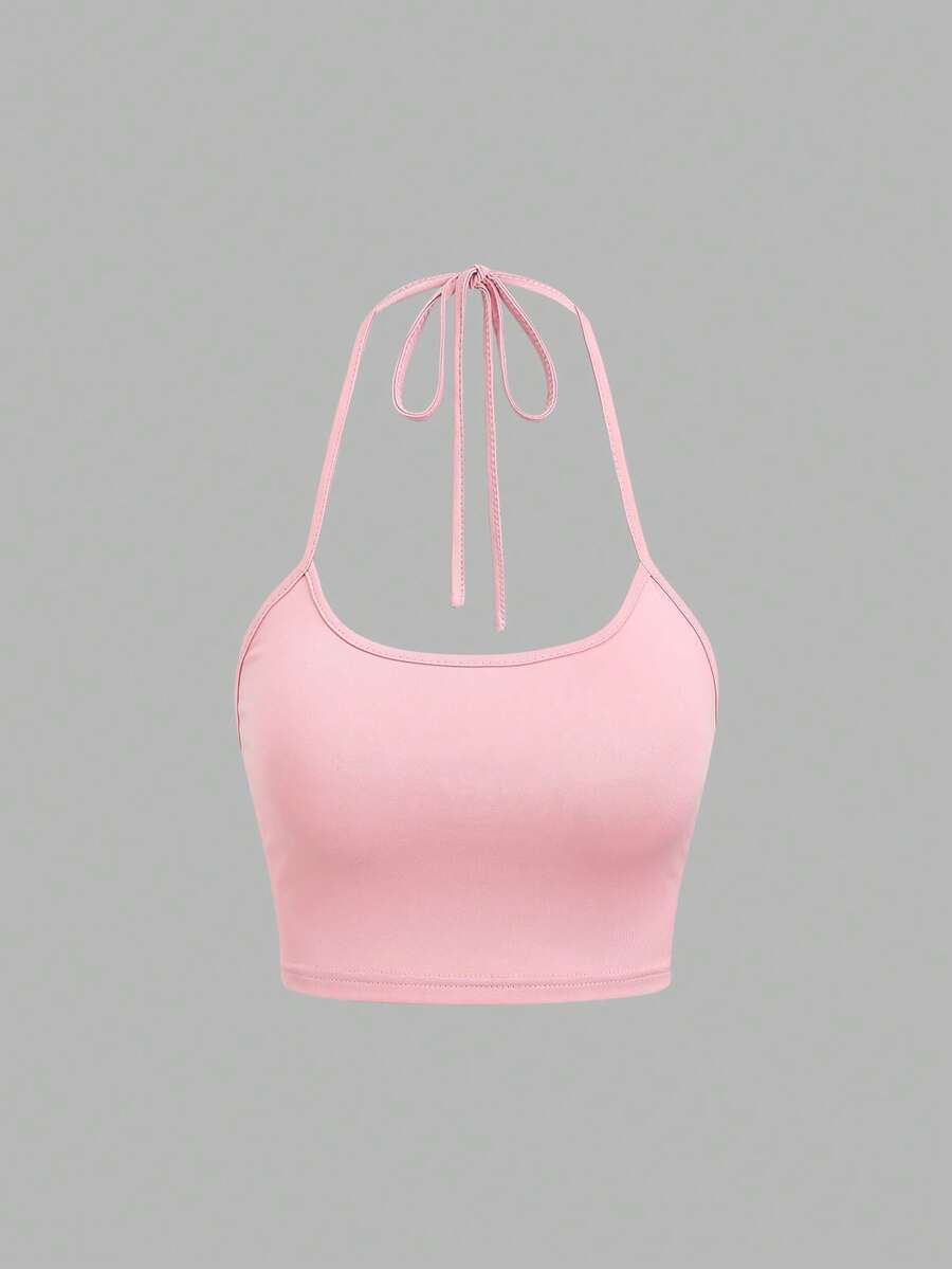 Women's striped tank top featuring an asymmetrical cold shoulder neckline and semi-sheer back.