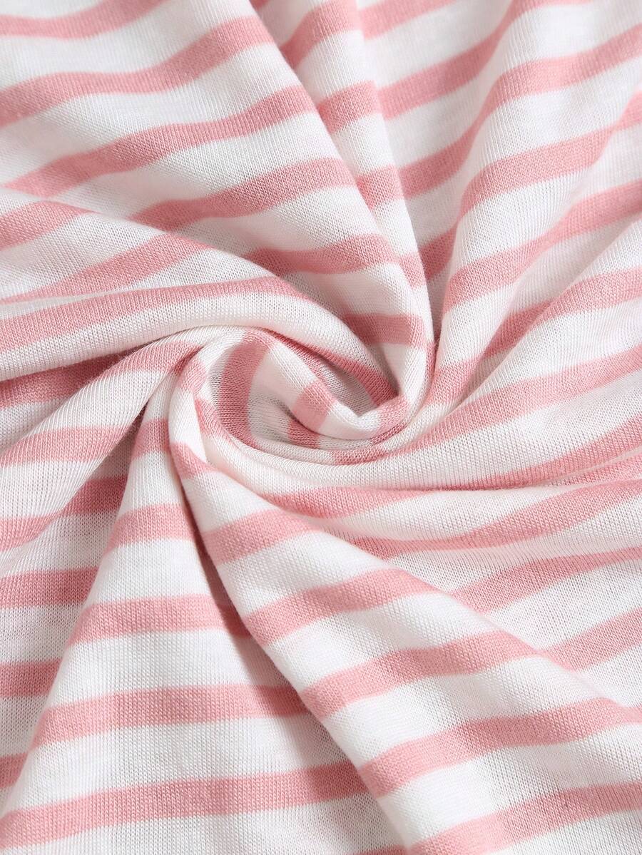 Women's striped tank top featuring an asymmetrical cold shoulder neckline and semi-sheer back.