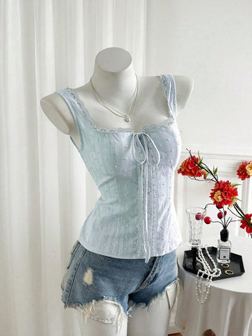 Women's 100% cotton sleeveless camisole top featuring a square neckline, wide straps, lace-up knot detail, and an asymmetrical hem.