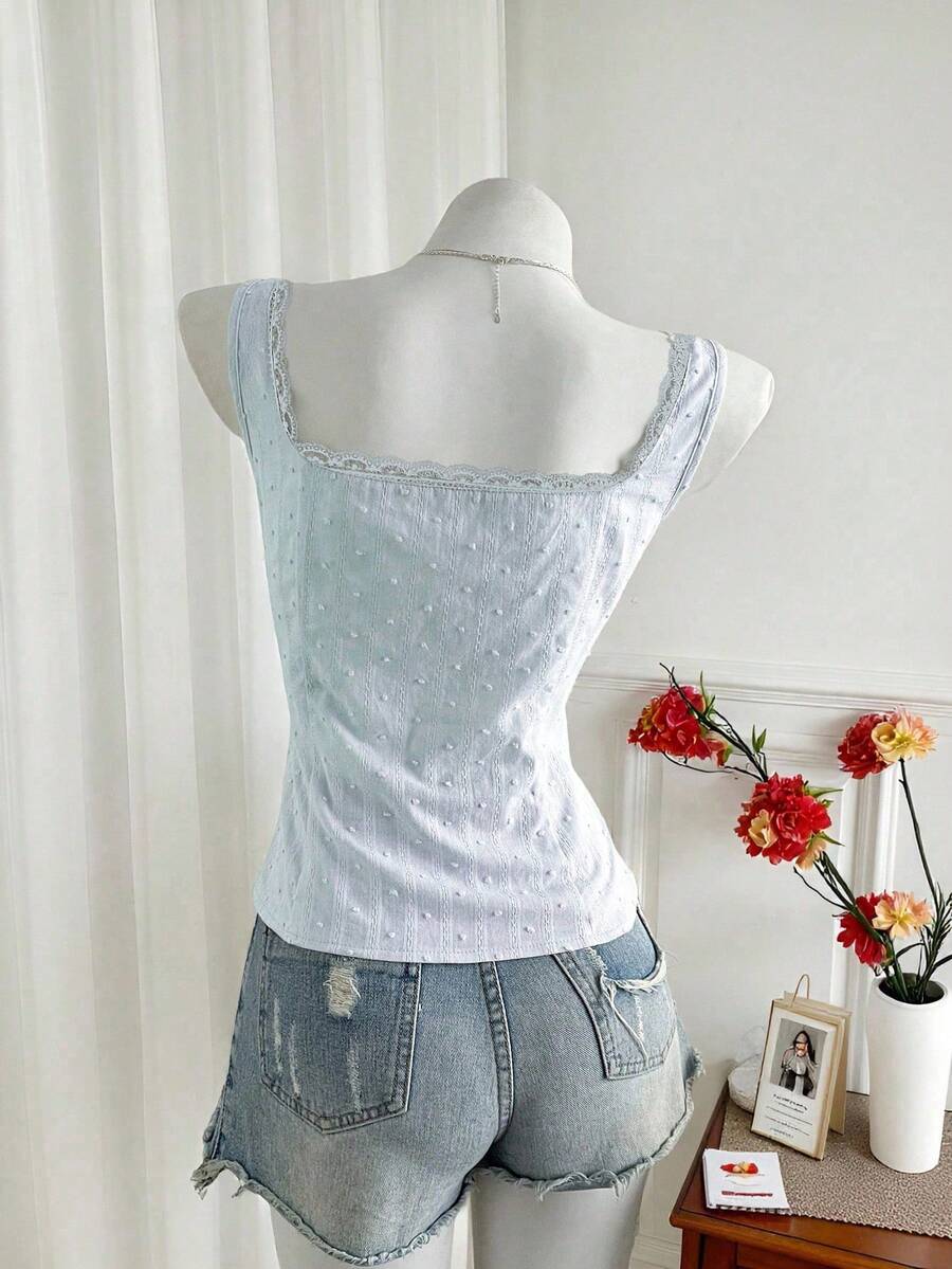Women's 100% cotton sleeveless camisole top featuring a square neckline, wide straps, lace-up knot detail, and an asymmetrical hem.
