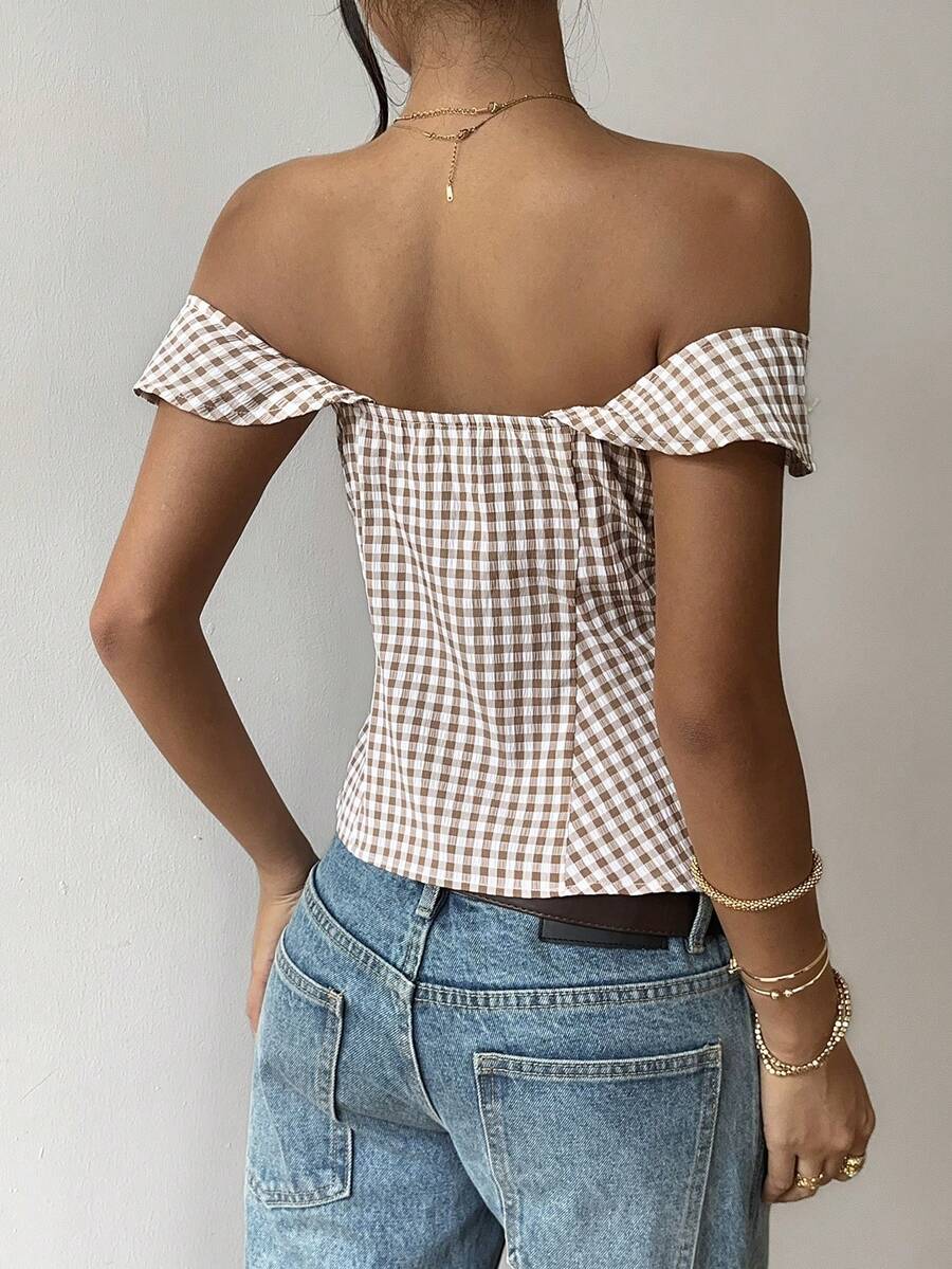 Brown gingham off-the-shoulder crop top for women featuring a slim fit, ruched design, cap sleeves, and knot detail.
