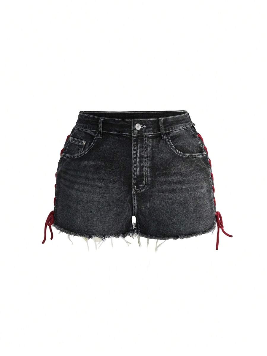 Plus size black gothic mini shorts with heart embroidery, graphic pocket pattern, lace-up detail, raw hem, and zipper fly