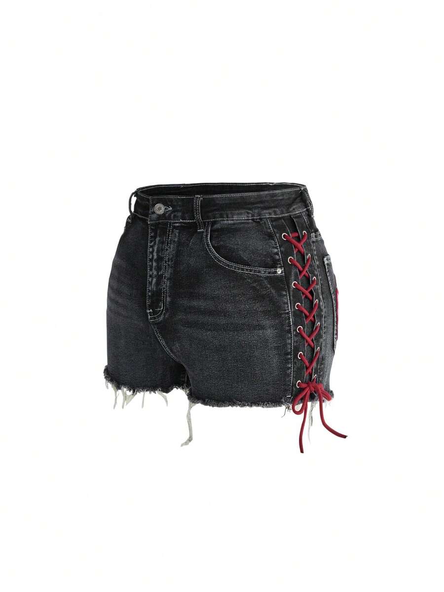 Plus size black gothic mini shorts with heart embroidery, graphic pocket pattern, lace-up detail, raw hem, and zipper fly