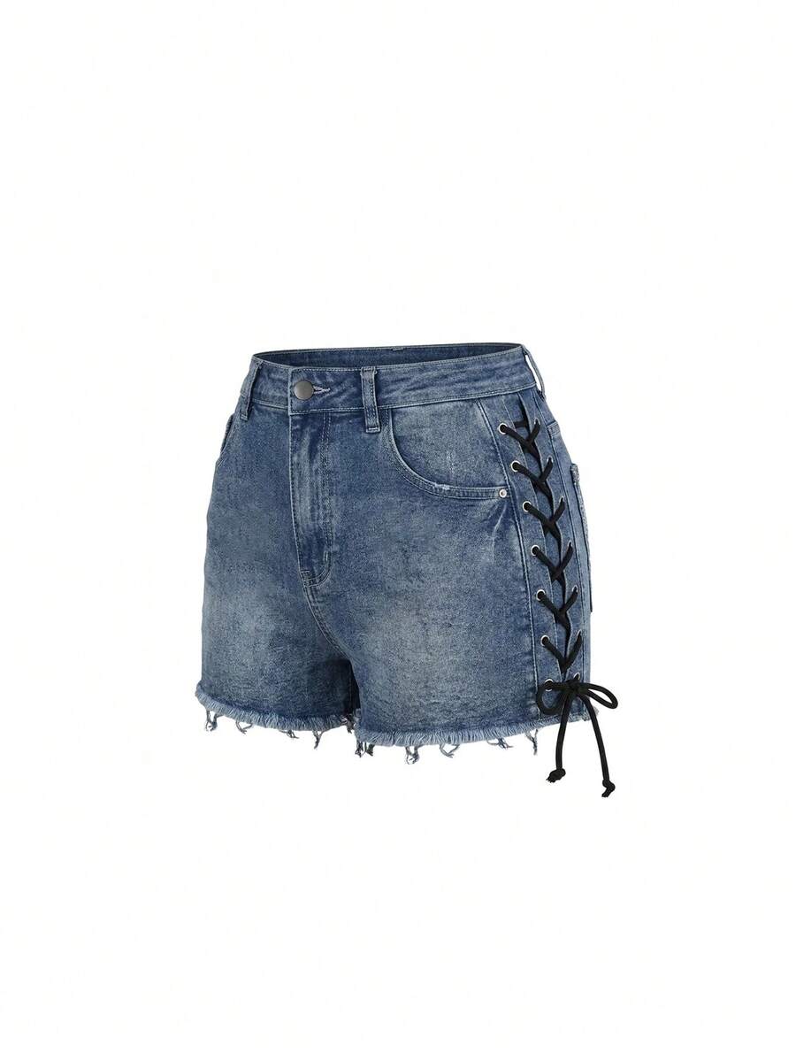 Plus size black gothic mini shorts with heart embroidery, graphic pocket pattern, lace-up detail, raw hem, and zipper fly