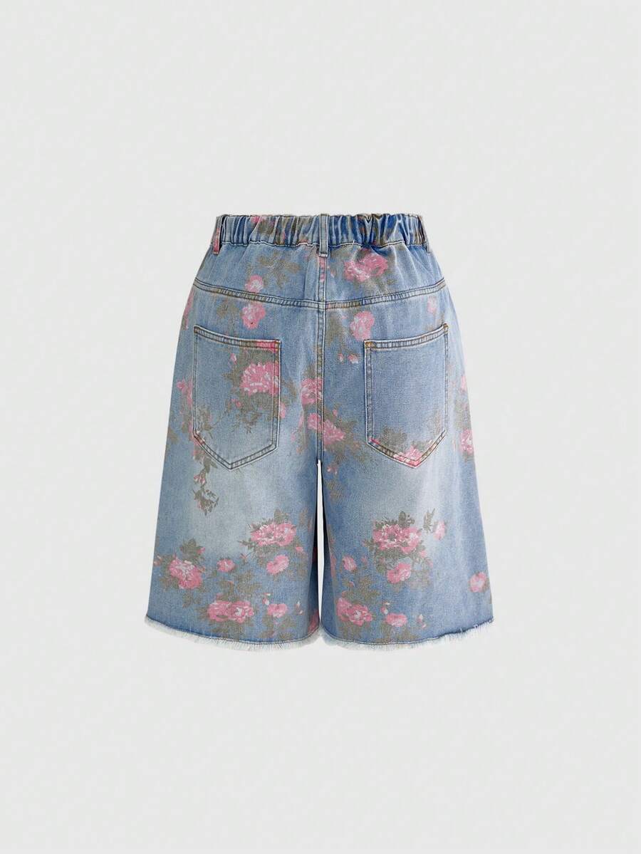 Women's loose wide-leg denim Bermuda shorts featuring vintage animal and paisley print with pockets and zipper fly.