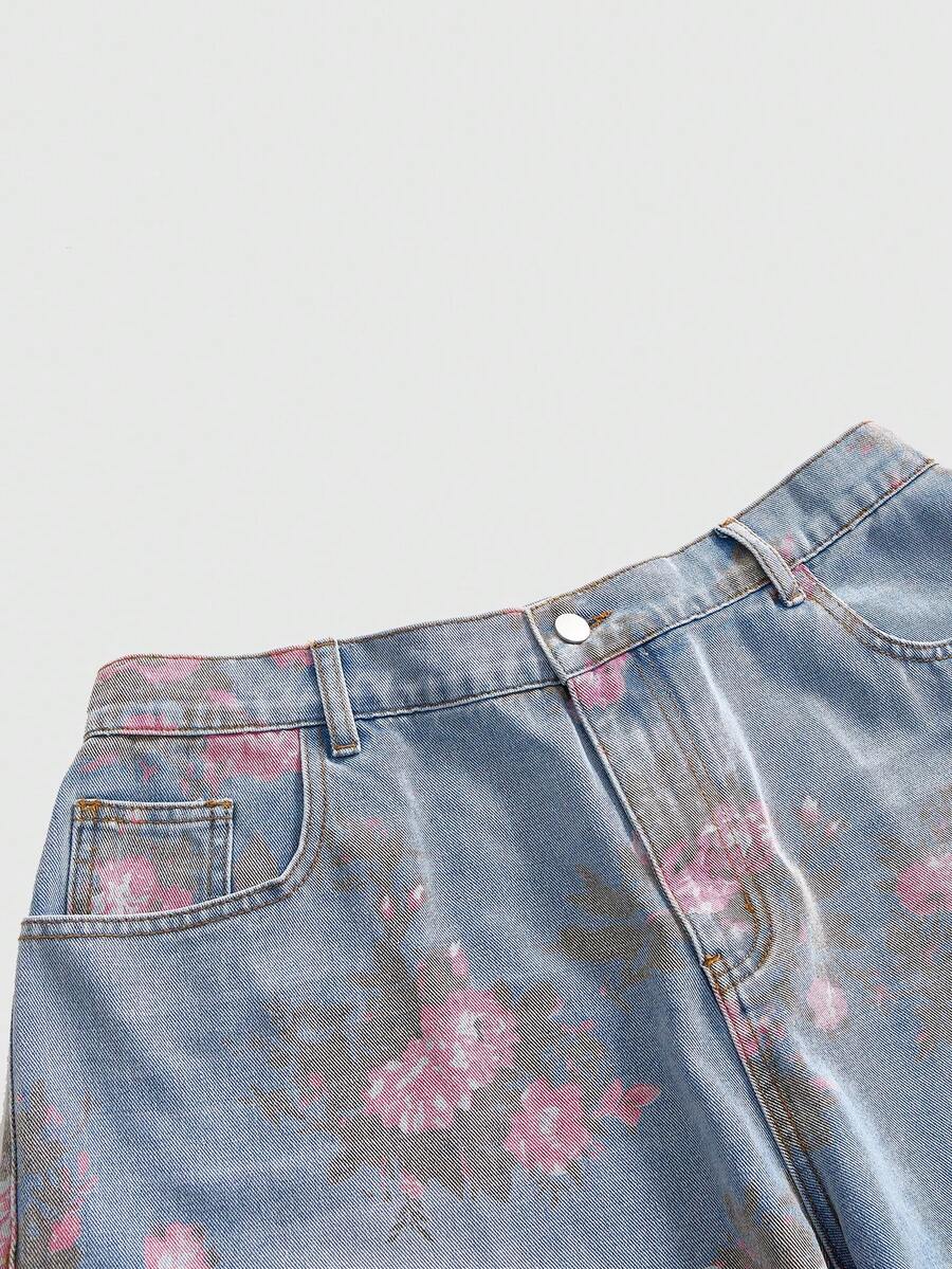 Women's loose wide-leg denim Bermuda shorts featuring vintage animal and paisley print with pockets and zipper fly.