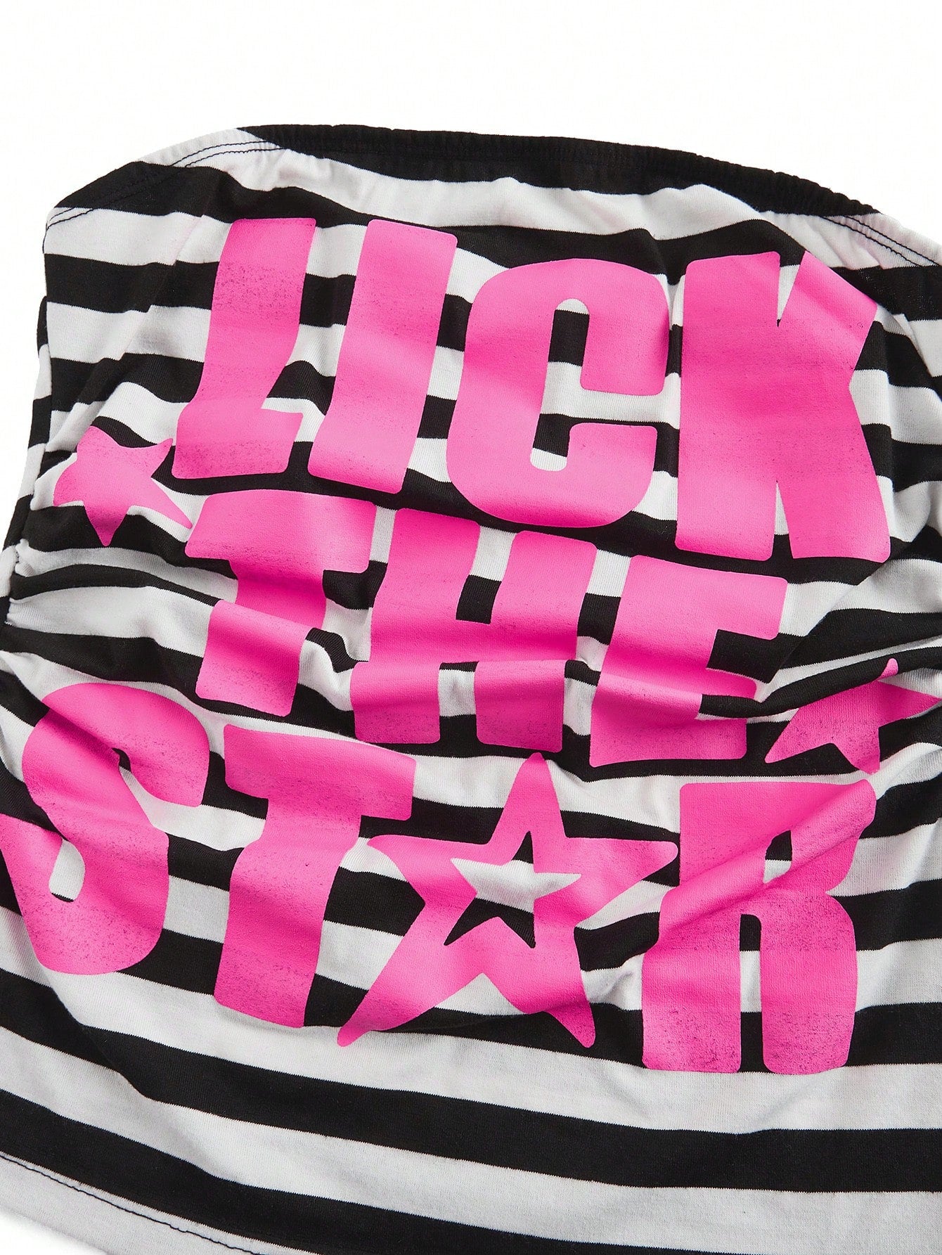 Women's Y2K bandeau crop top with ruched detail, slogan lettering, striped pattern, and star print in a strapless sleeveless cropped slim-fit style.