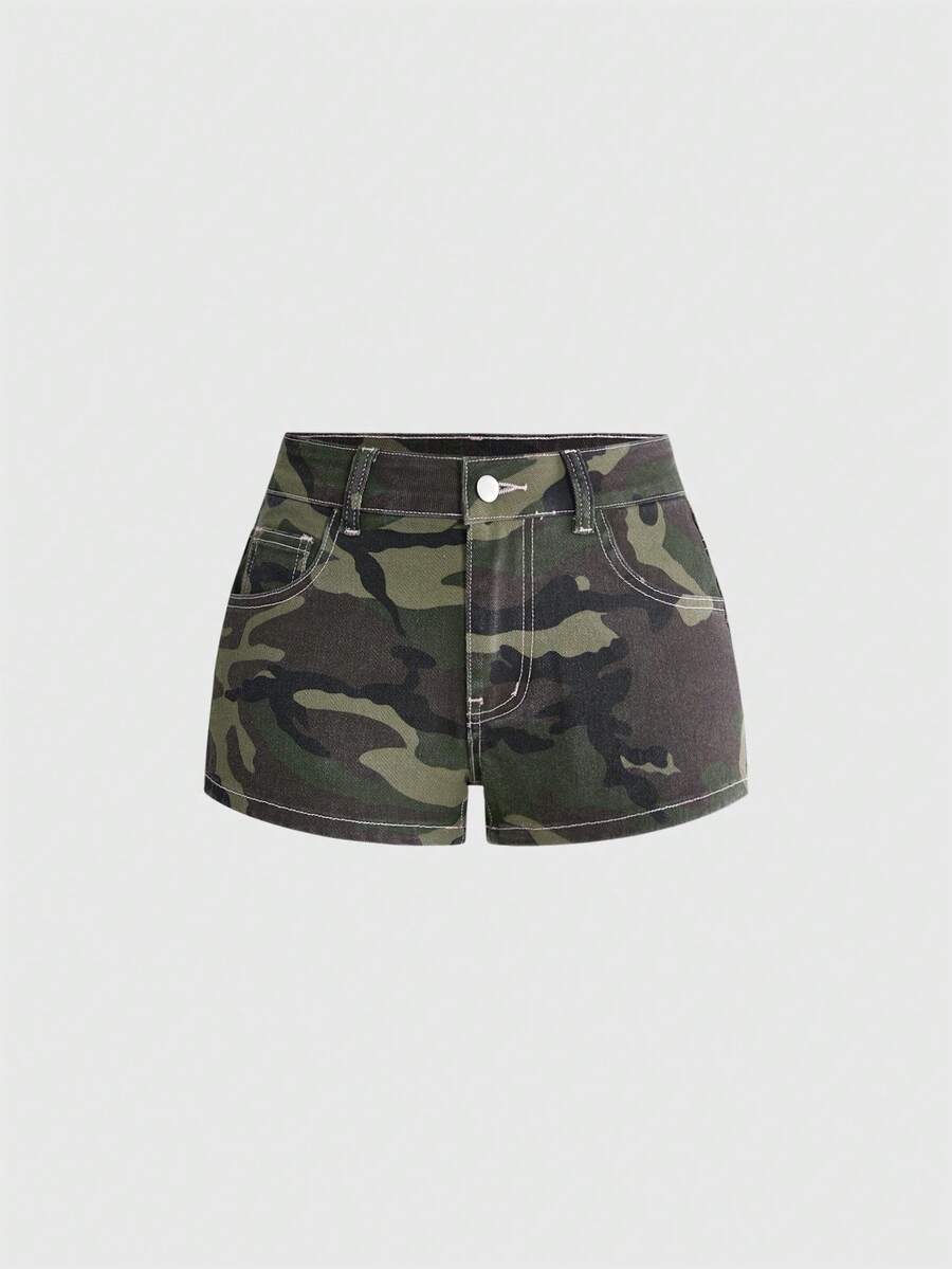 Women's ultra low waist mini shorts with back pockets, zipper fly, button detail, random print, and star patch in a grunge punk Y2K style.