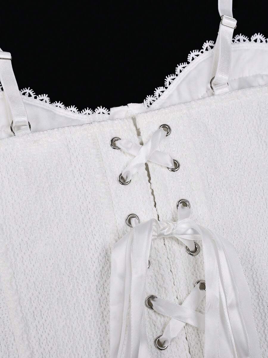 White elegant corset top with lace trim, cup details, adjustable spaghetti straps, and a back tie with grommet eyelets.