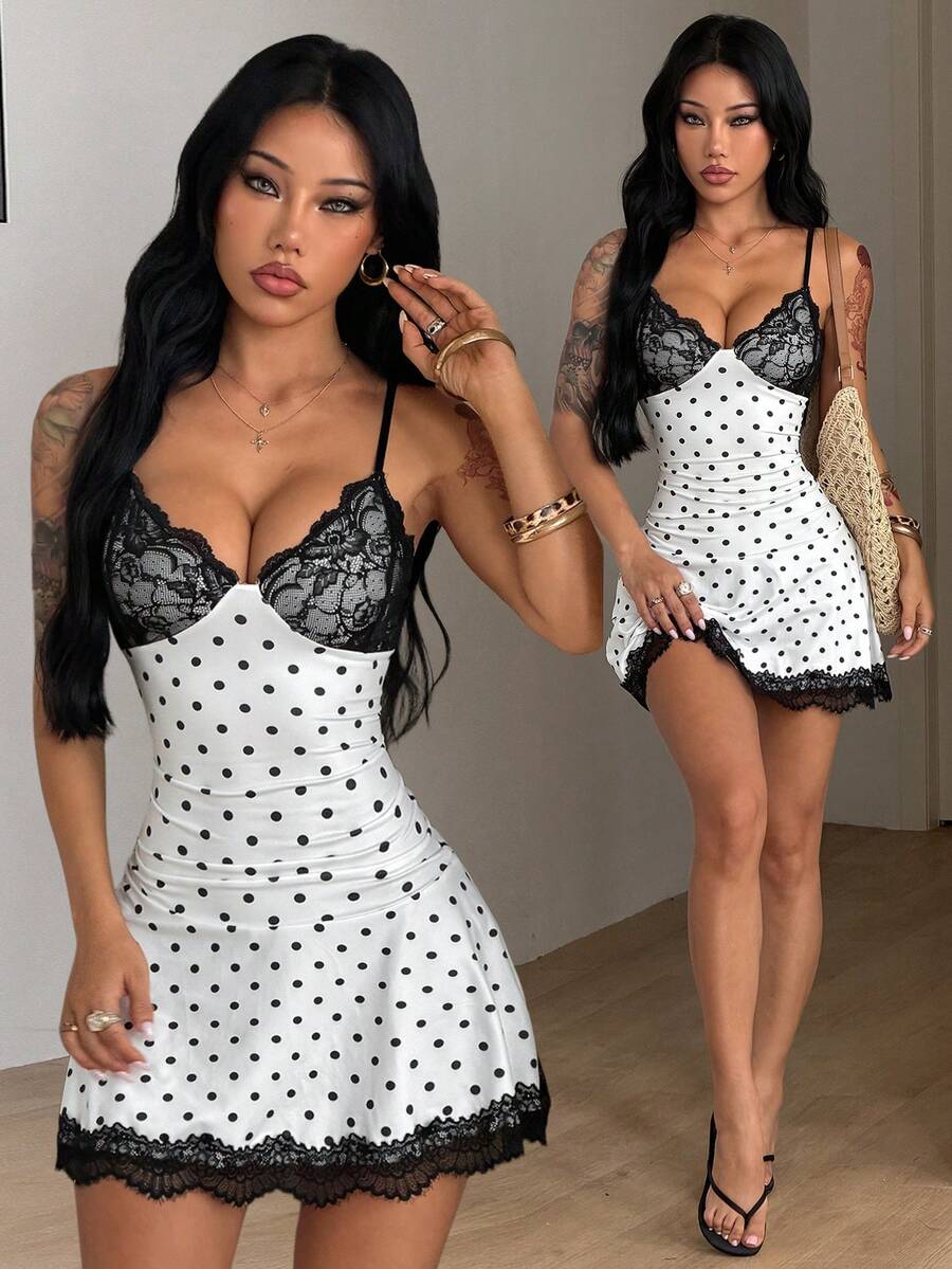 Women's black and white polka dot cami mini dress with contrast lace trim, spaghetti straps, and slim pencil fit.