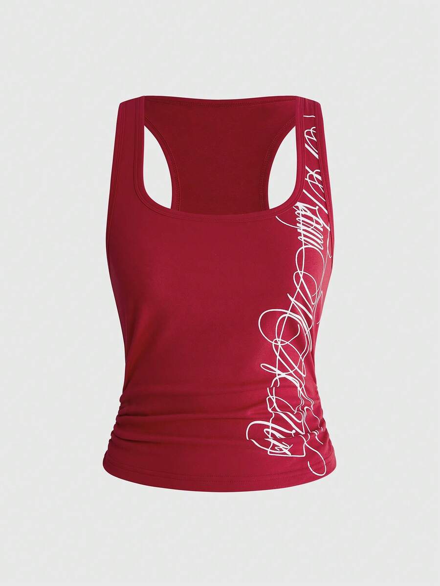 Punk-inspired two-piece set with a fitted scoop neck slogan tank top featuring cross and rhinestone details paired with ultra low waist mini shorts.