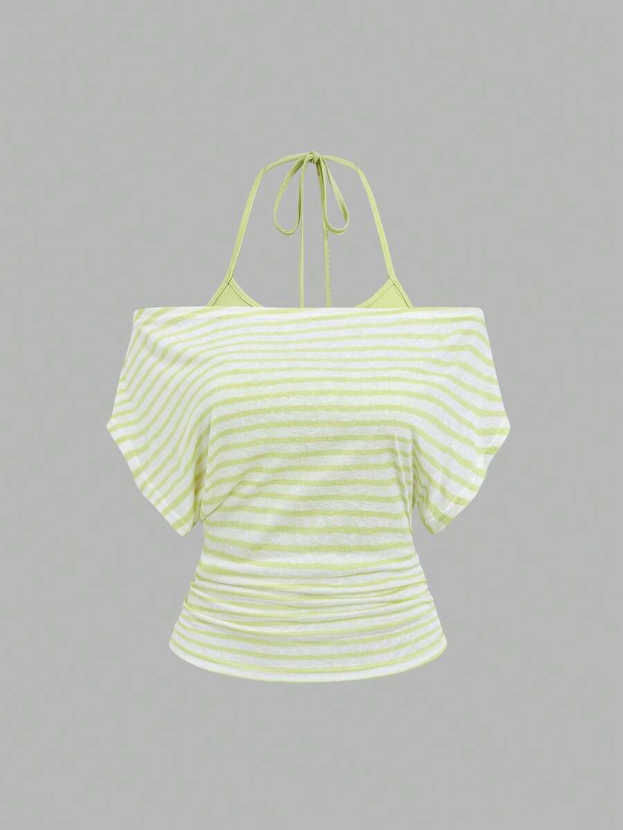 Women's striped tank top featuring an asymmetrical cold shoulder neckline and semi-sheer back.