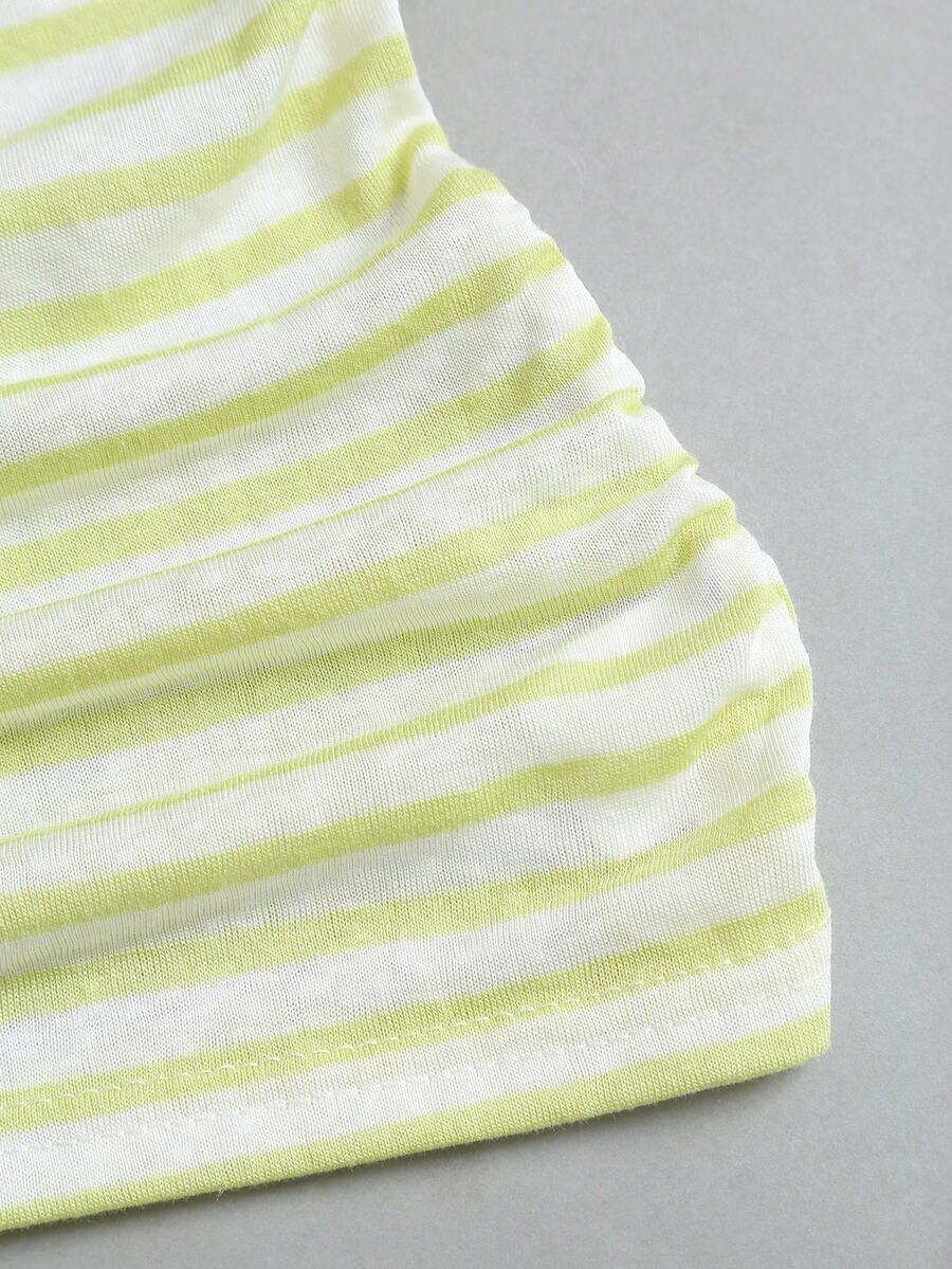 Women's striped tank top featuring an asymmetrical cold shoulder neckline and semi-sheer back.