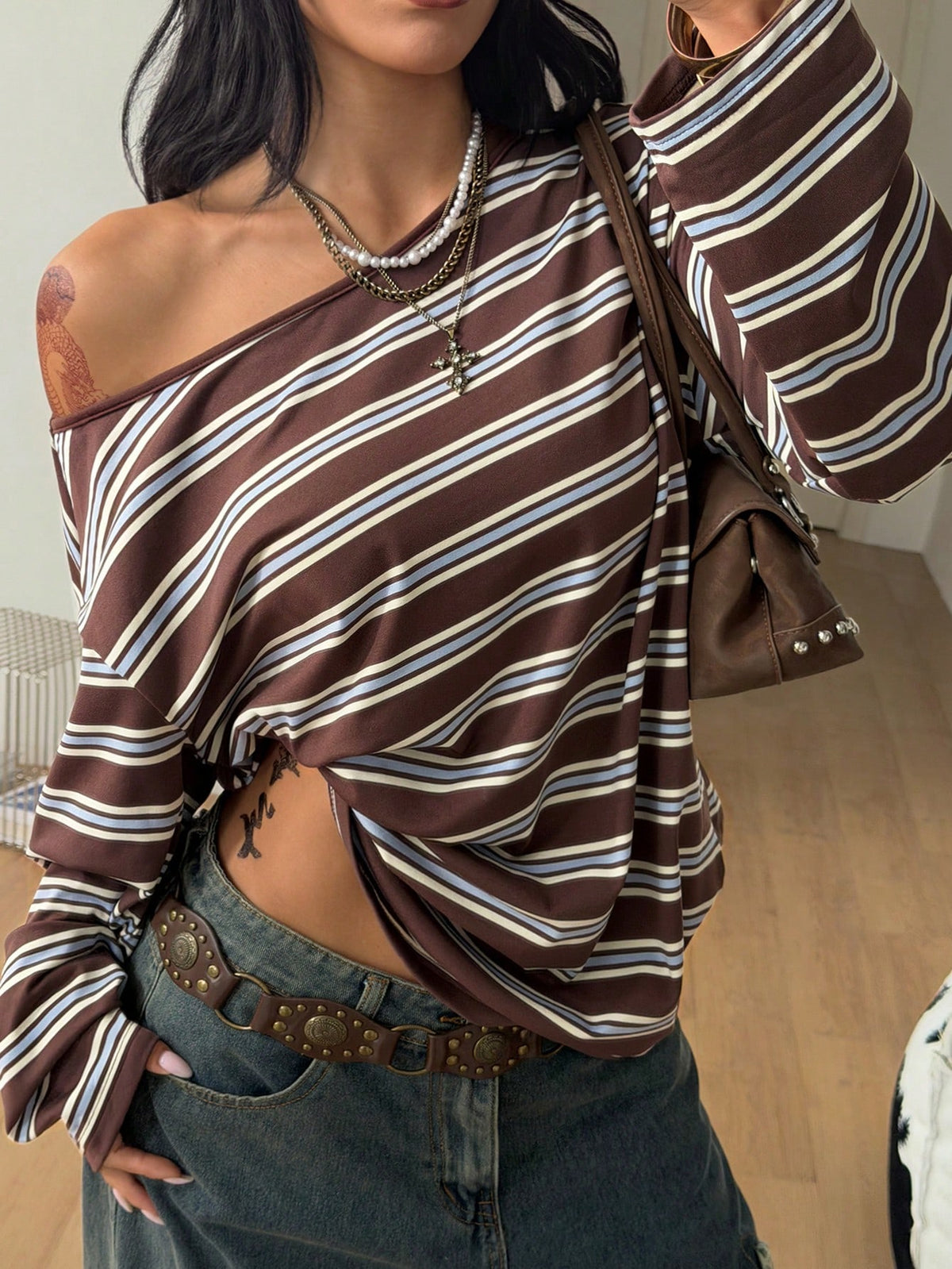Women's brown striped boat neck long sleeve raglan T-shirt with a loose casual fit
