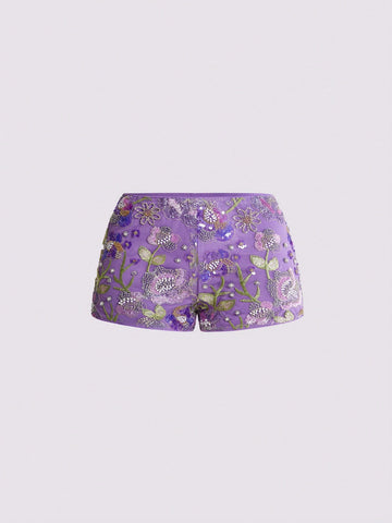 Women's ultra low waist shiny sequin mini shorts featuring a zipper fly, button closure, and high-stretch lined fabric for festival and night out outfits.