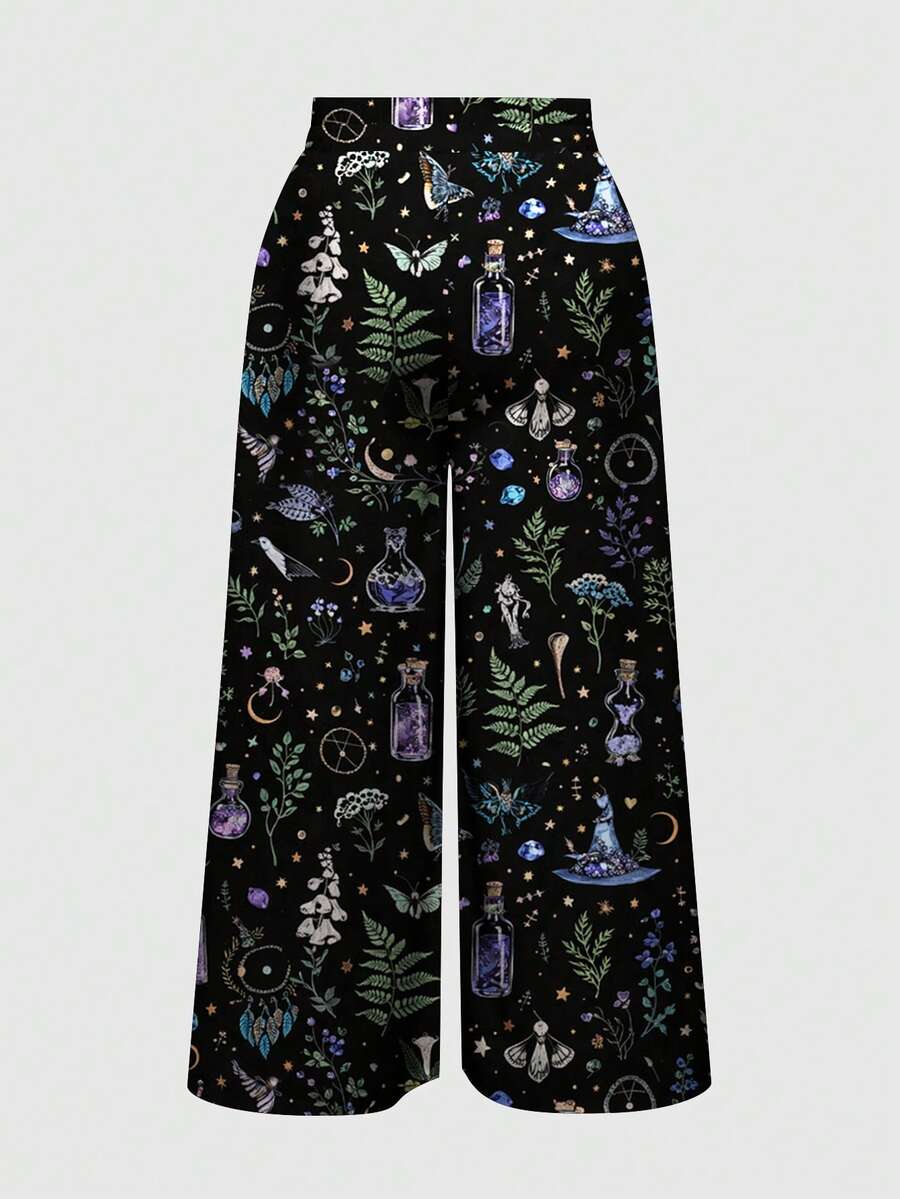 Women's plus size black gothic wide leg pants with split thigh detail and celestial moth, sun, and star pattern.