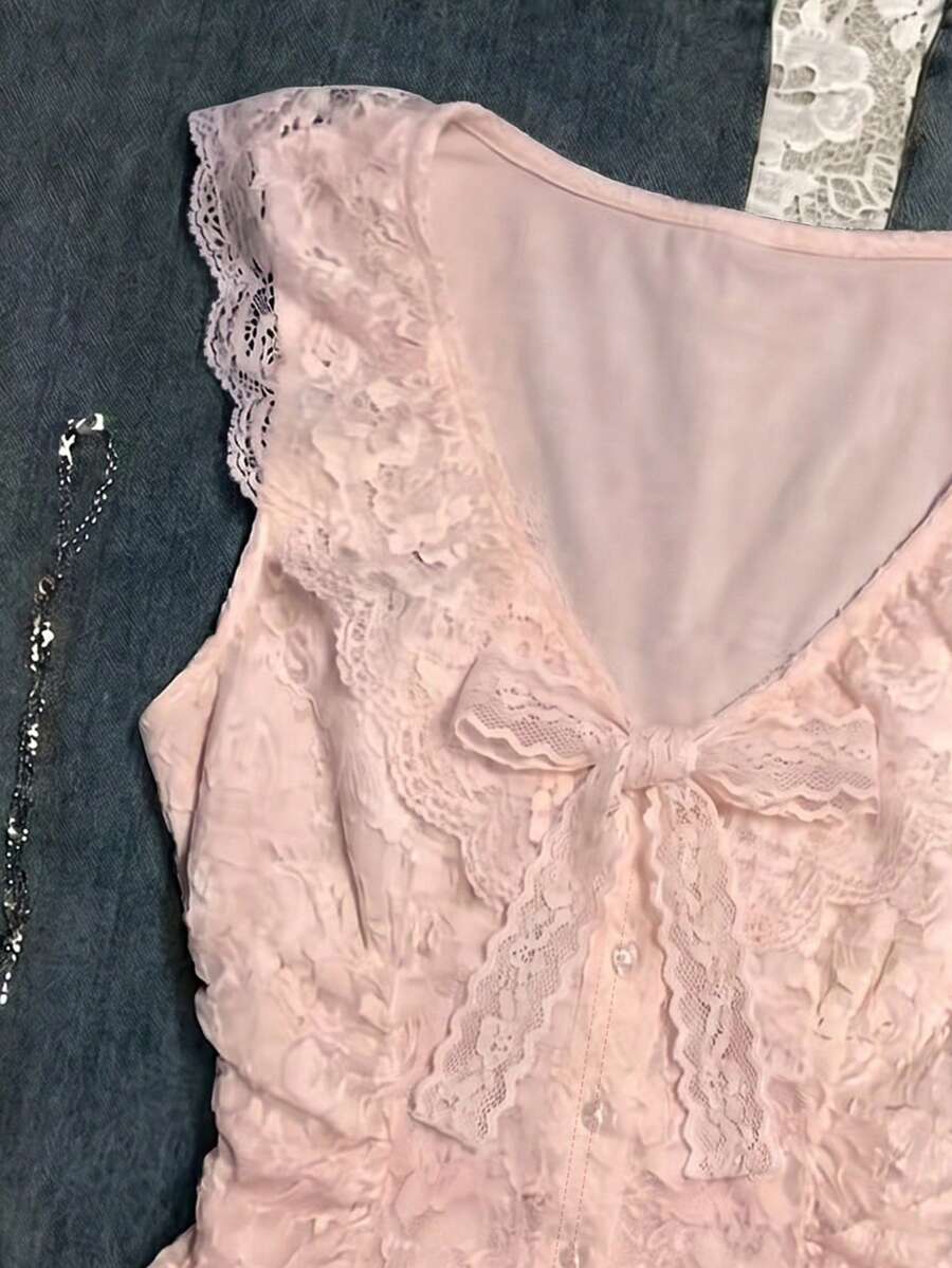 Franclia women's slim fit V-neck sleeveless tank top featuring lace patchwork detailing and a bow accent.