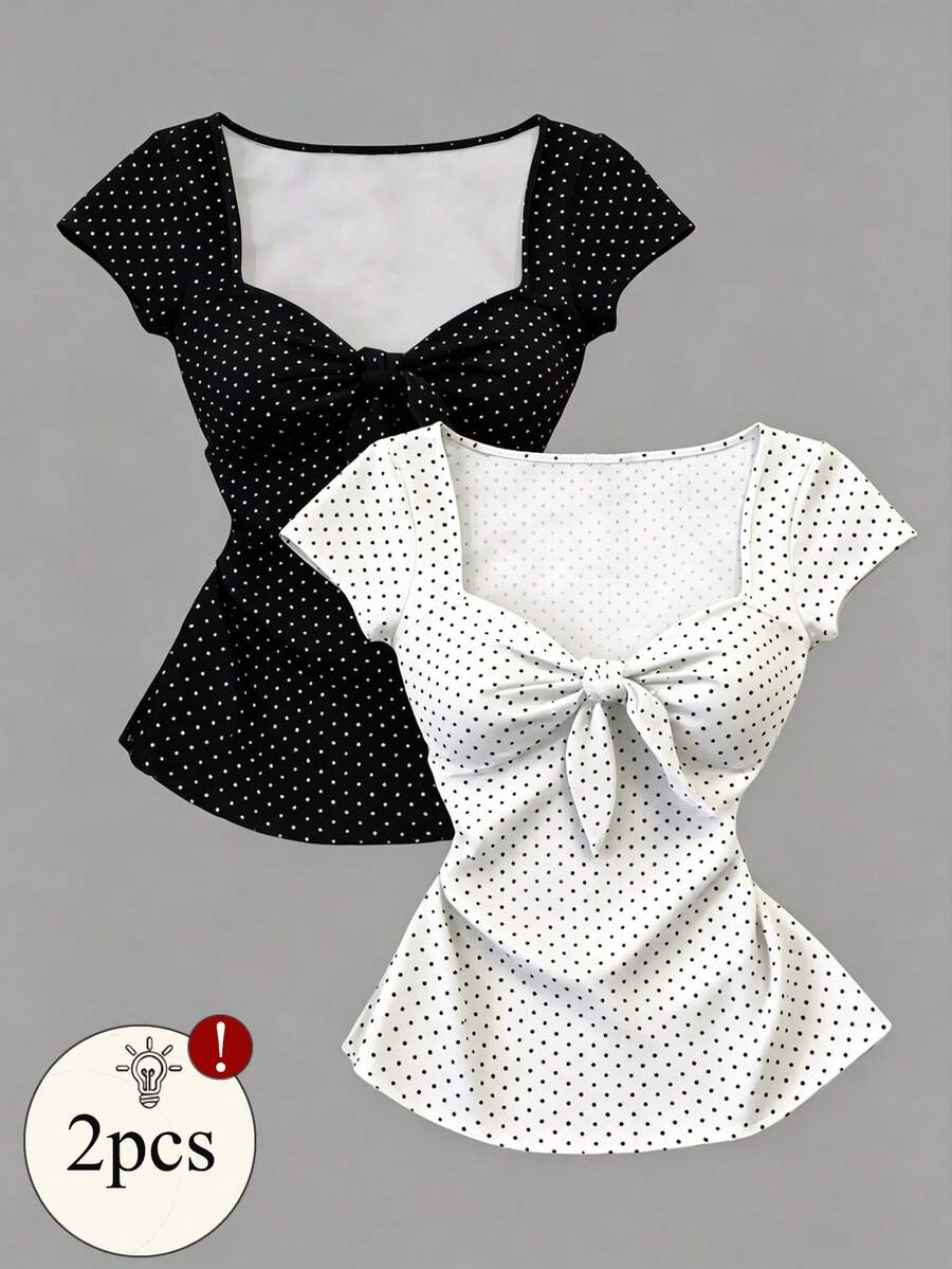 Women's short sleeve fitted t-shirt with a front knot detail, contrast collar, and raglan sleeves.
