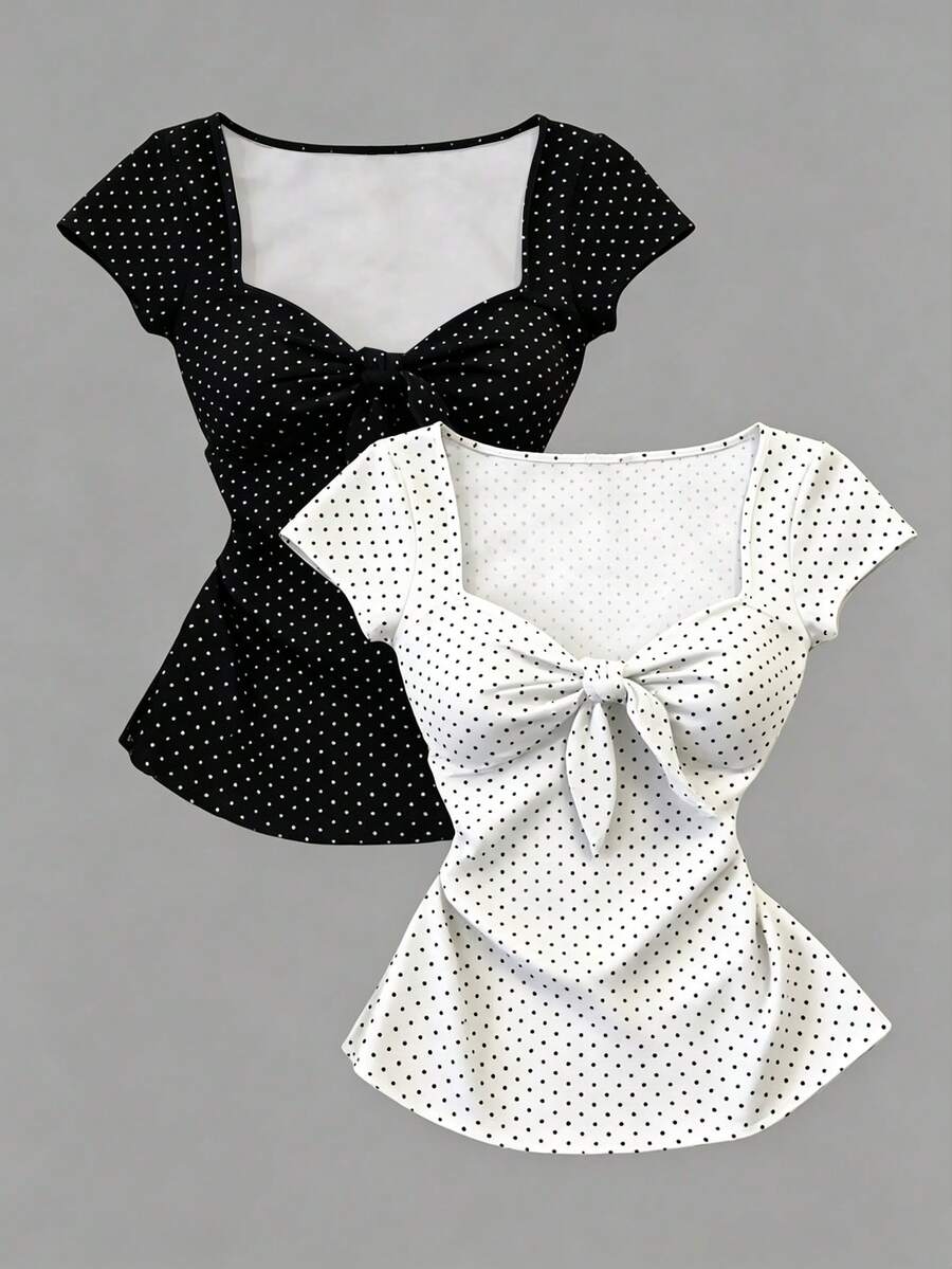 Women's short sleeve fitted t-shirt with a front knot detail, contrast collar, and raglan sleeves.