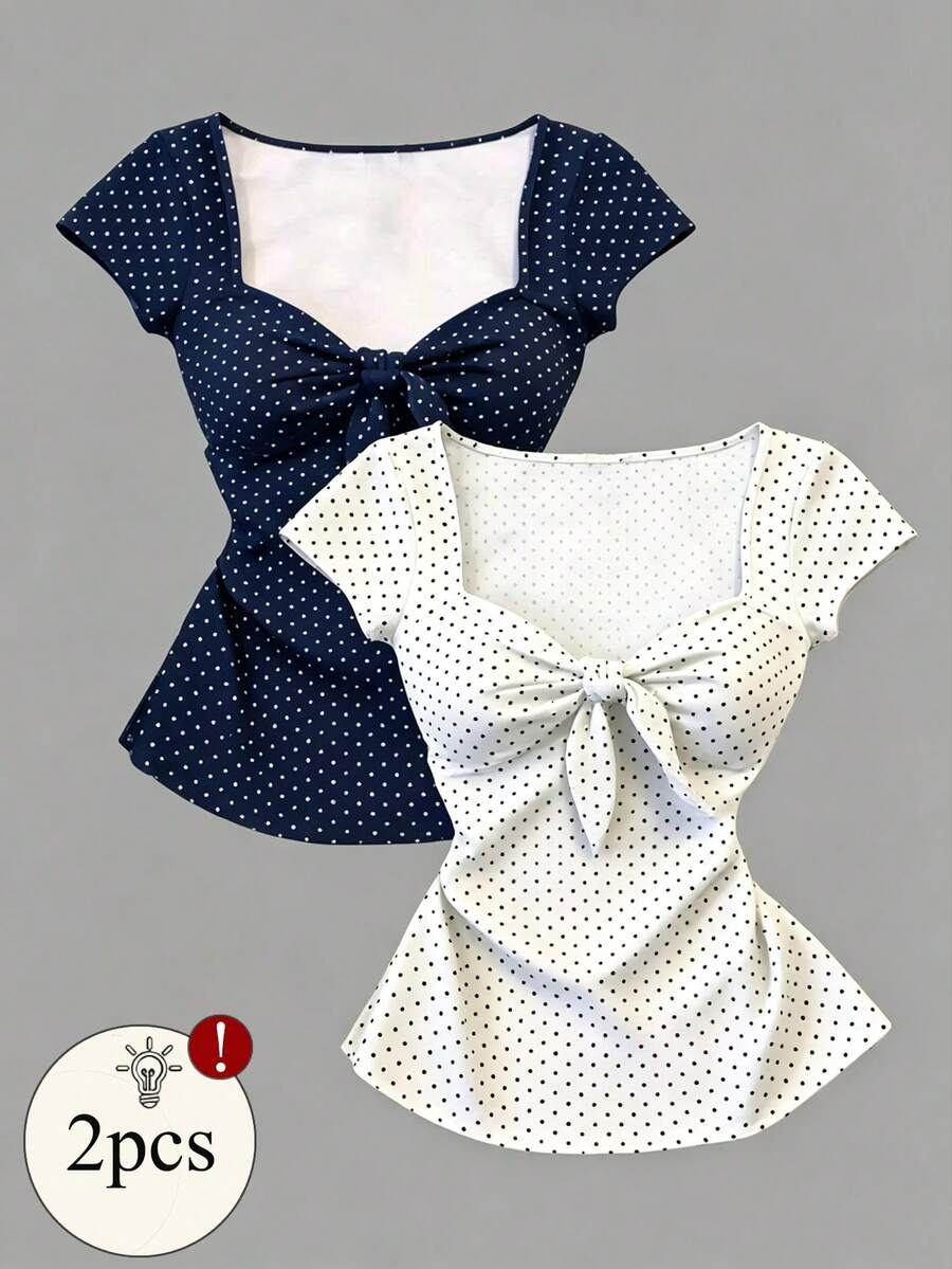 Women's short sleeve fitted t-shirt with a front knot detail, contrast collar, and raglan sleeves.