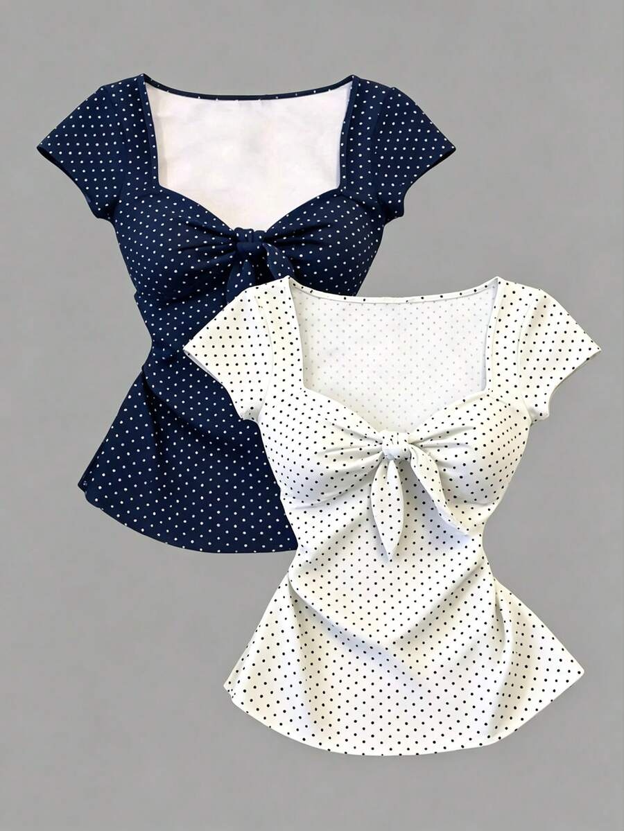 Women's short sleeve fitted t-shirt with a front knot detail, contrast collar, and raglan sleeves.