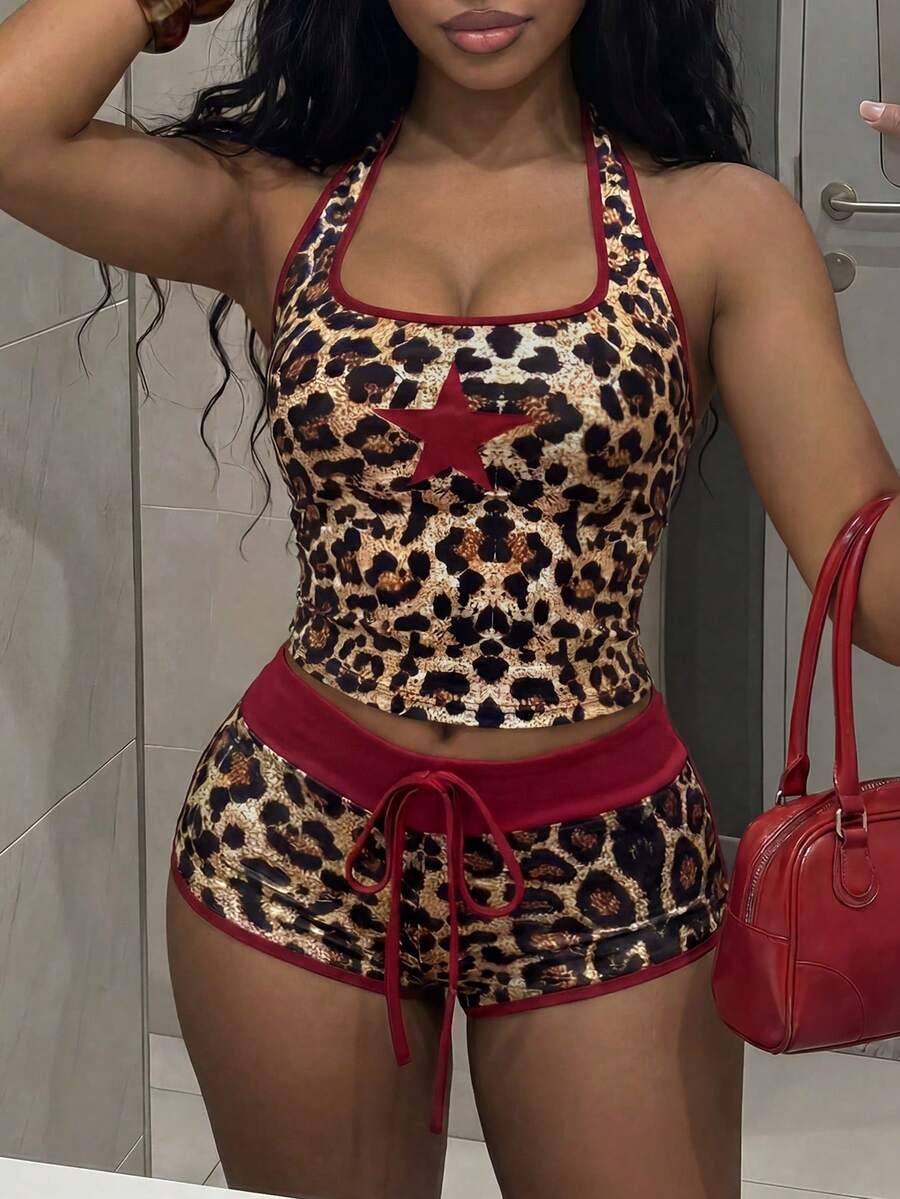 Women's multicolor halter camisole and mini shorts two-piece outfit with backless knot detail, contrast binding, and textured pattern.
