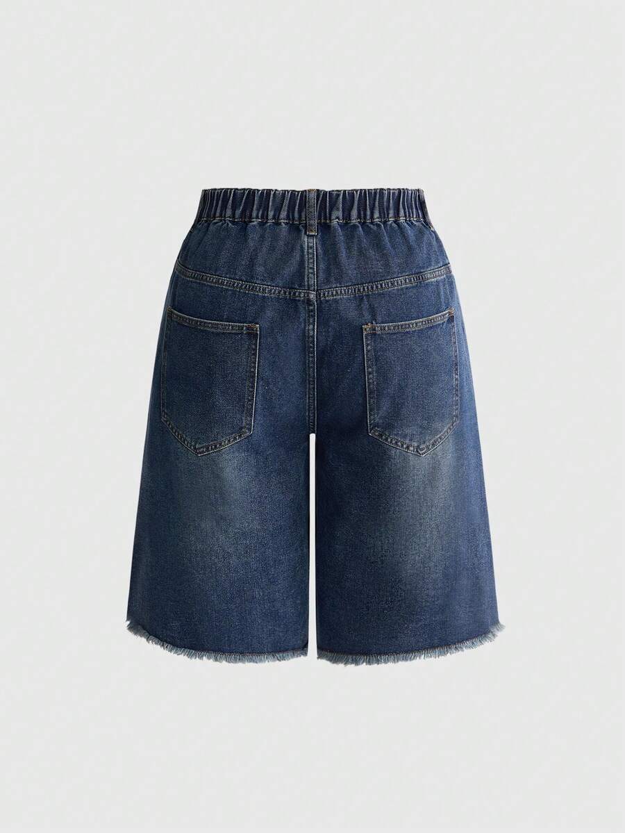 Women's loose wide-leg denim Bermuda shorts featuring vintage animal and paisley print with pockets and zipper fly.
