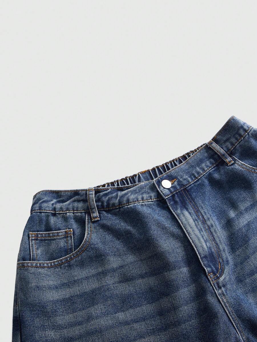 Women's loose wide-leg denim Bermuda shorts featuring vintage animal and paisley print with pockets and zipper fly.