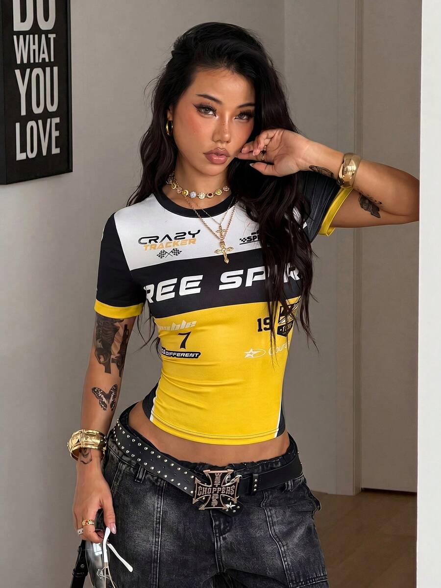 Women's slim fit short sleeve graphic T-shirt in yellow featuring a round neckline with contrast binding