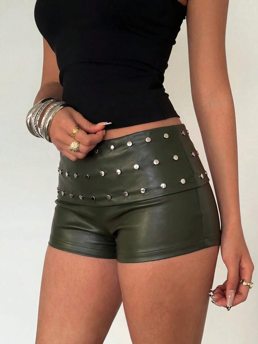 Women's studded PU ultra low waist mini shorts with zipper fly closure, skinny fit, mini length, and plain unlined design.
