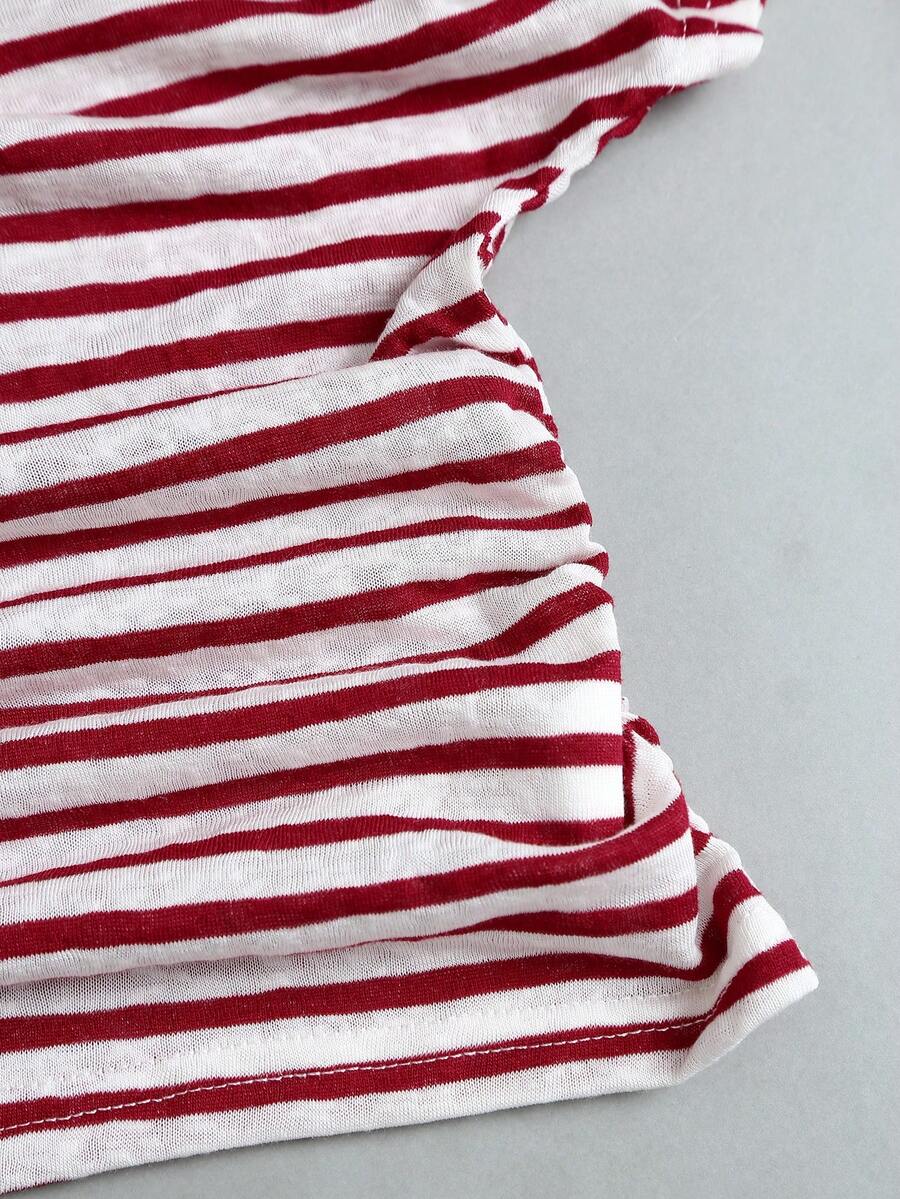 Women's striped tank top featuring an asymmetrical cold shoulder neckline and semi-sheer back.