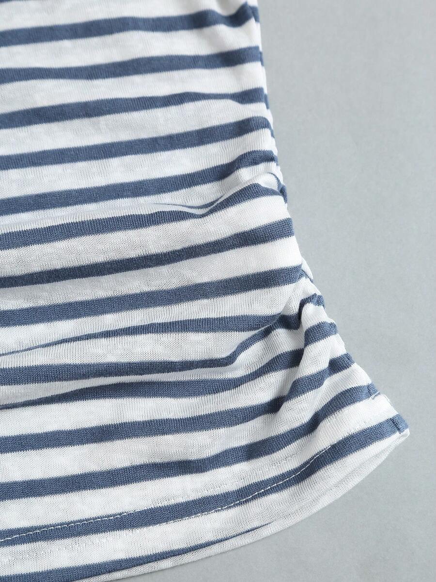 Women's striped tank top featuring an asymmetrical cold shoulder neckline and semi-sheer back.