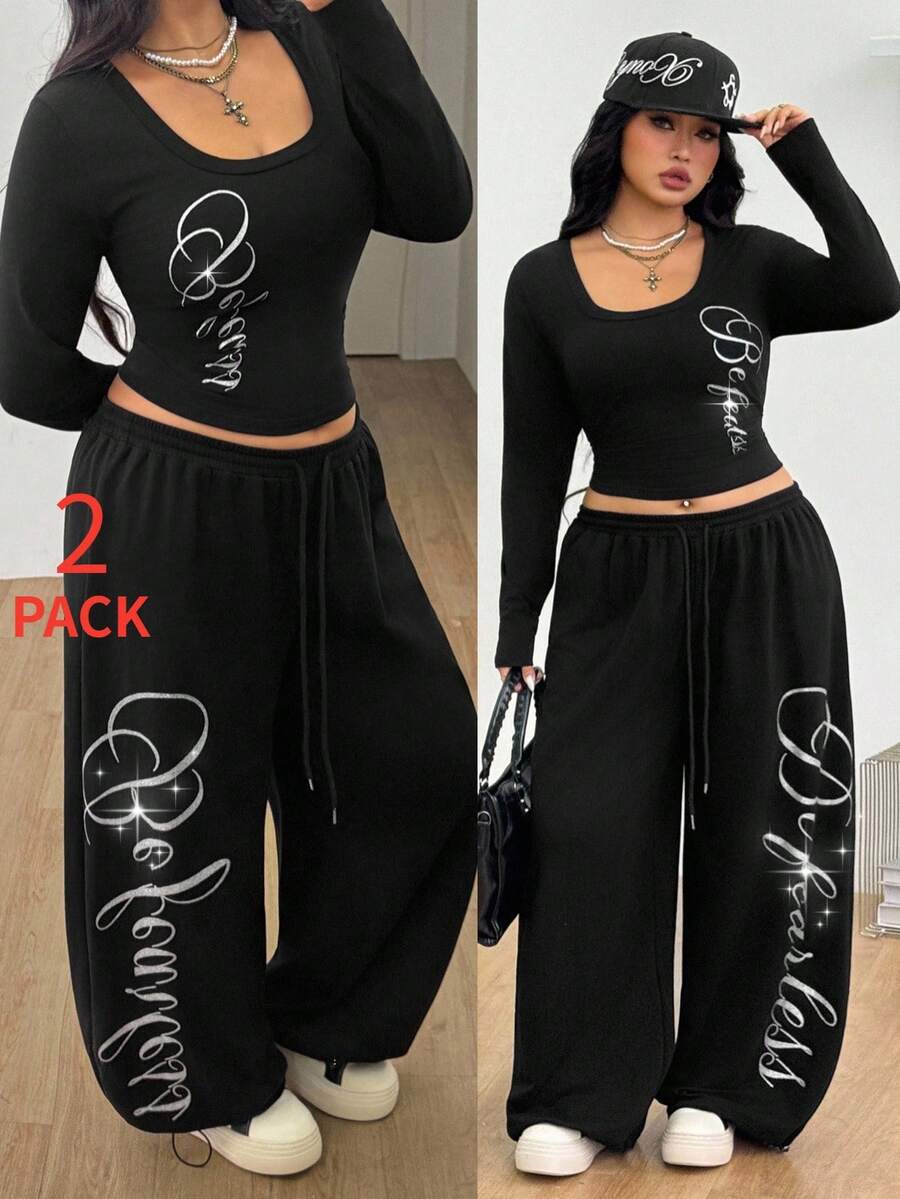 Women's black two-piece casual outfit featuring a long sleeve scoop neck letter print t-shirt and matching wide leg sweatpants made of knitted cotton blend fabric.