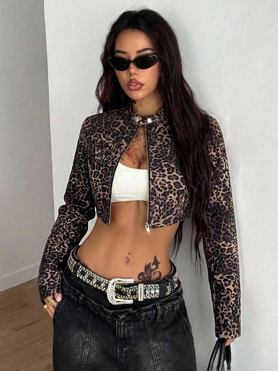 Women's metallic grey cropped faux leather jacket featuring a stand collar and asymmetrical zip front closure.