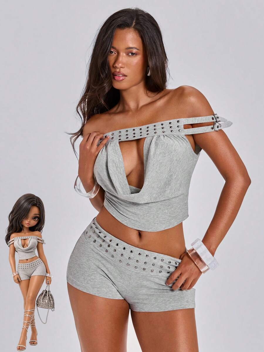 Women's grey Y2K two-piece set featuring an off-the-shoulder crop top with studded details and matching mini shorts.