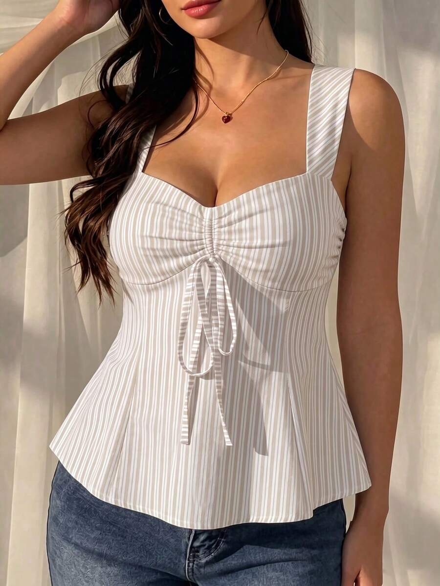 Women's striped camisole tank top with strap neckline, backless knot detail, cold shoulder styling, slim fit, and flared hem for casual vacation or daily wear.