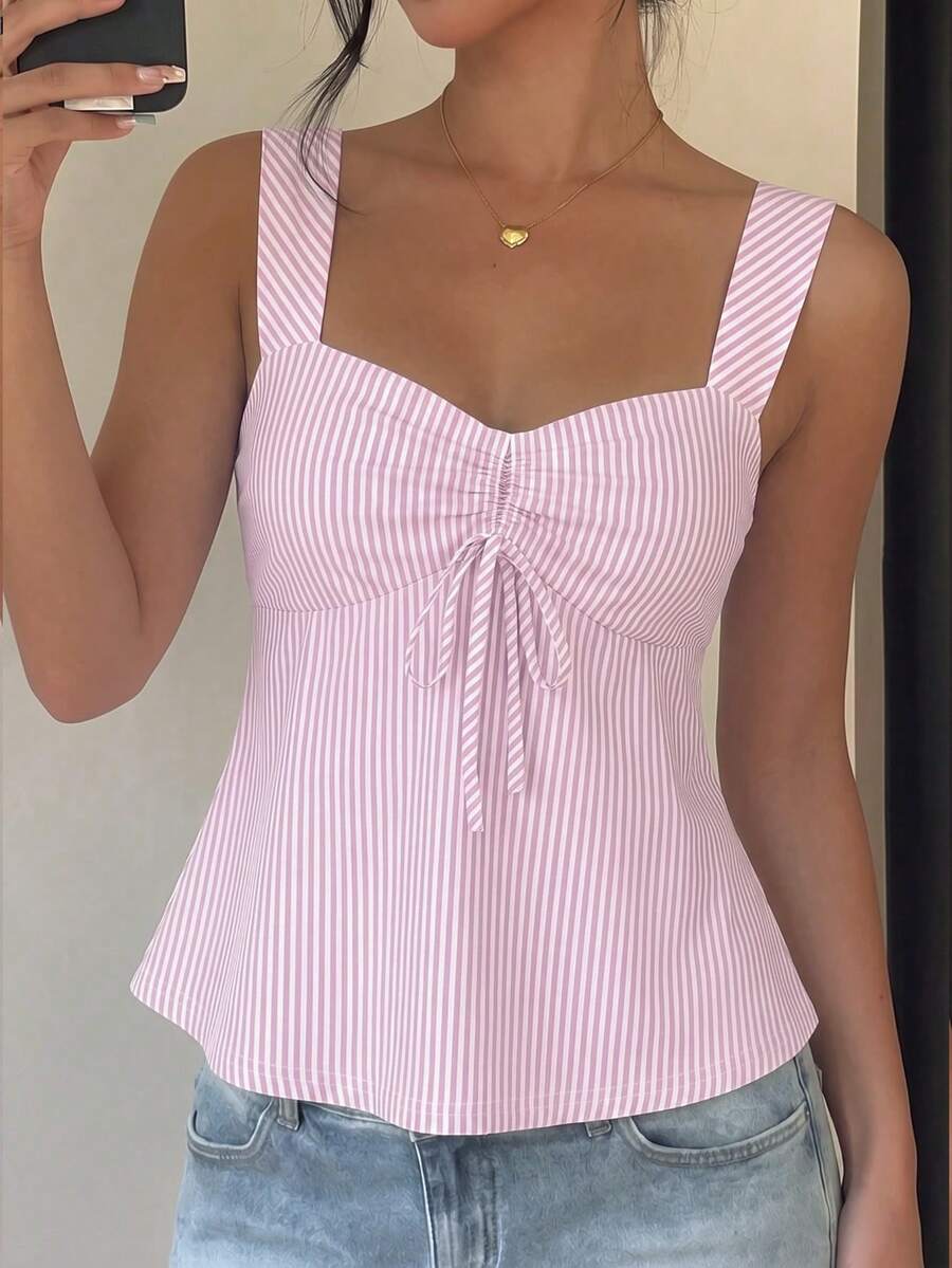 Women's striped camisole tank top with strap neckline, backless knot detail, cold shoulder styling, slim fit, and flared hem for casual vacation or daily wear.