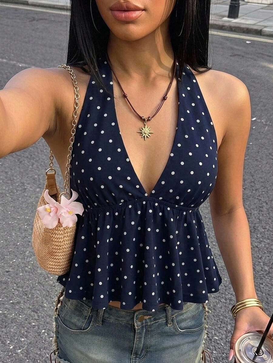 Women's polka dot print halter camisole with backless knot detail, ruched front, slim fit, and flared ruffle hem