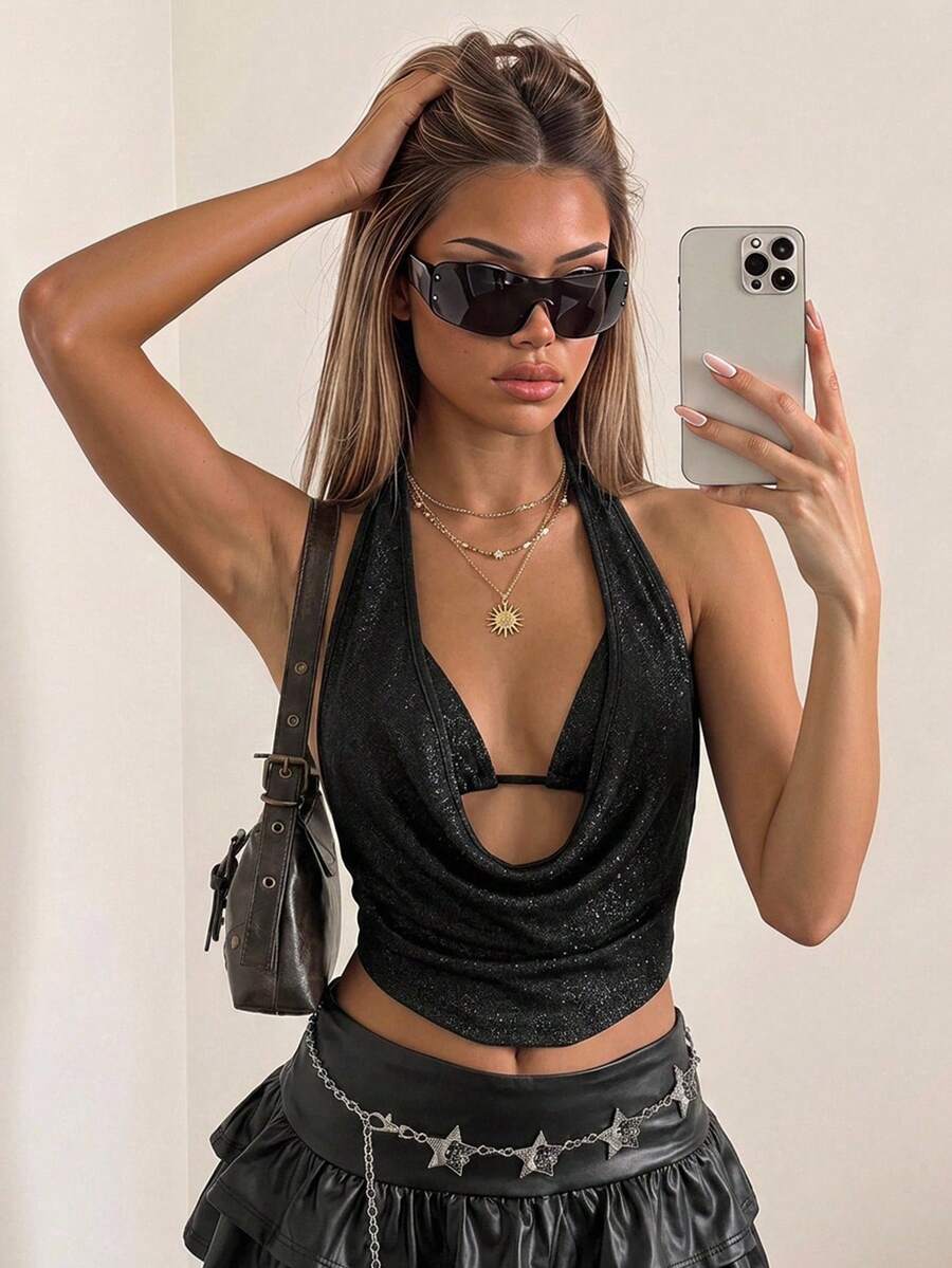 Women's glitter halter backless micro crop tank top featuring a draped knot front design.