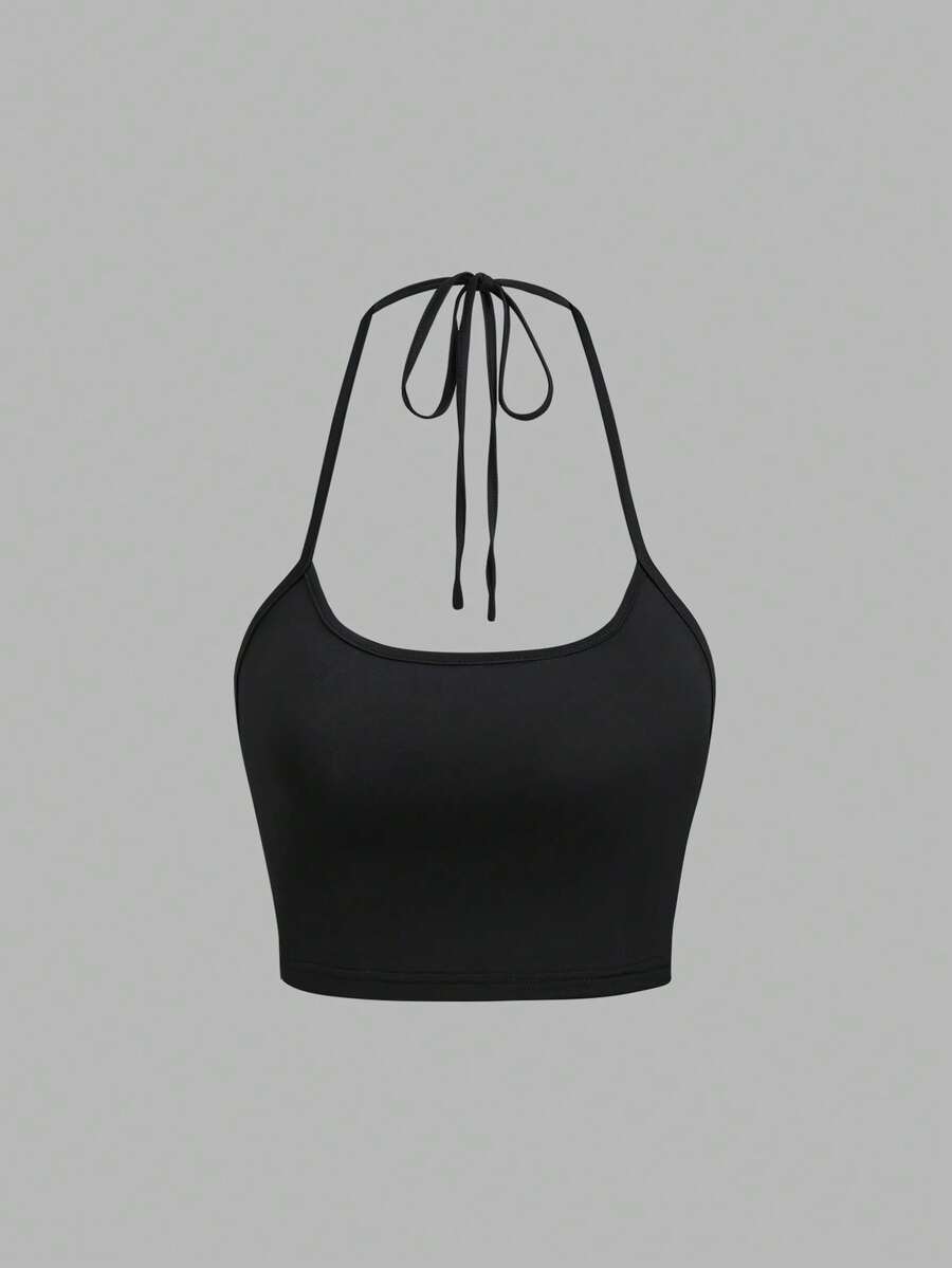 Women's striped tank top featuring an asymmetrical cold shoulder neckline and semi-sheer back.