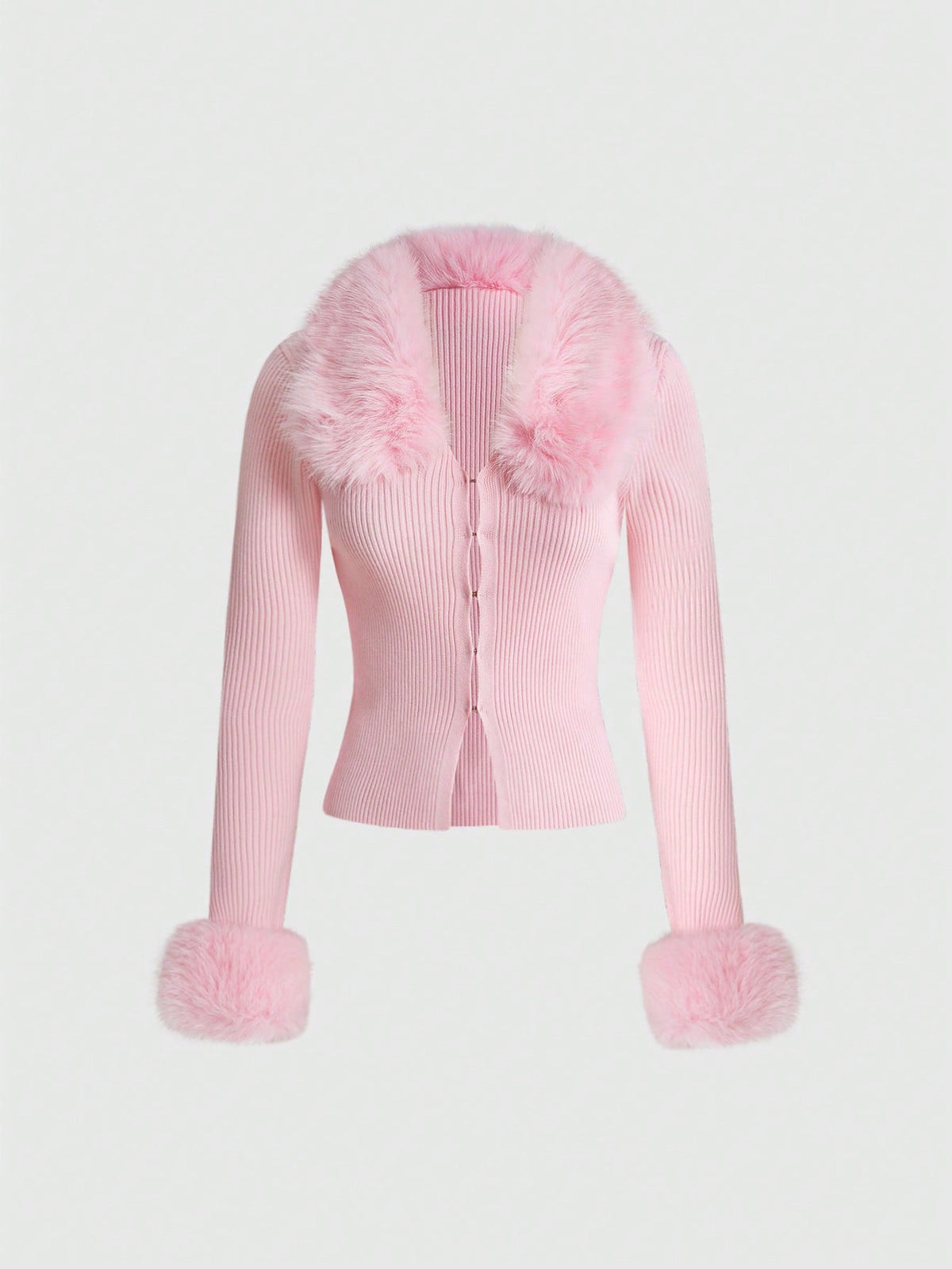 Pink ribbed knit women's cardigan featuring a contrast faux fur collar, button-up front closure, extra-long sleeves, and slim fit waist-cinching silhouette.