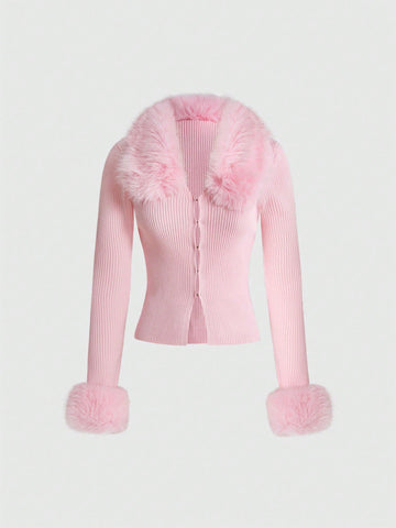 Pink ribbed knit women's cardigan featuring a contrast faux fur collar, button-up front closure, extra-long sleeves, and slim fit waist-cinching silhouette.