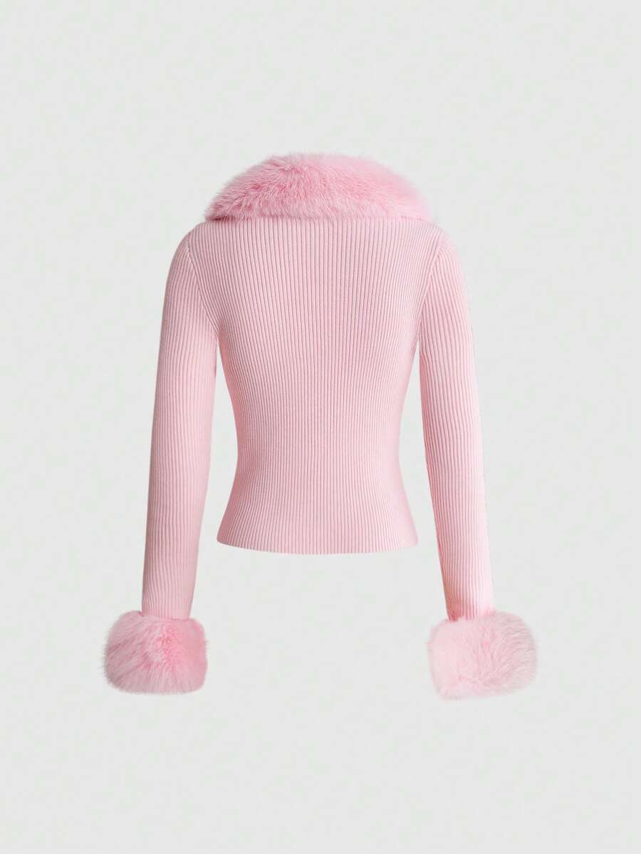 Pink ribbed knit women's cardigan featuring a contrast faux fur collar, button-up front closure, extra-long sleeves, and slim fit waist-cinching silhouette.